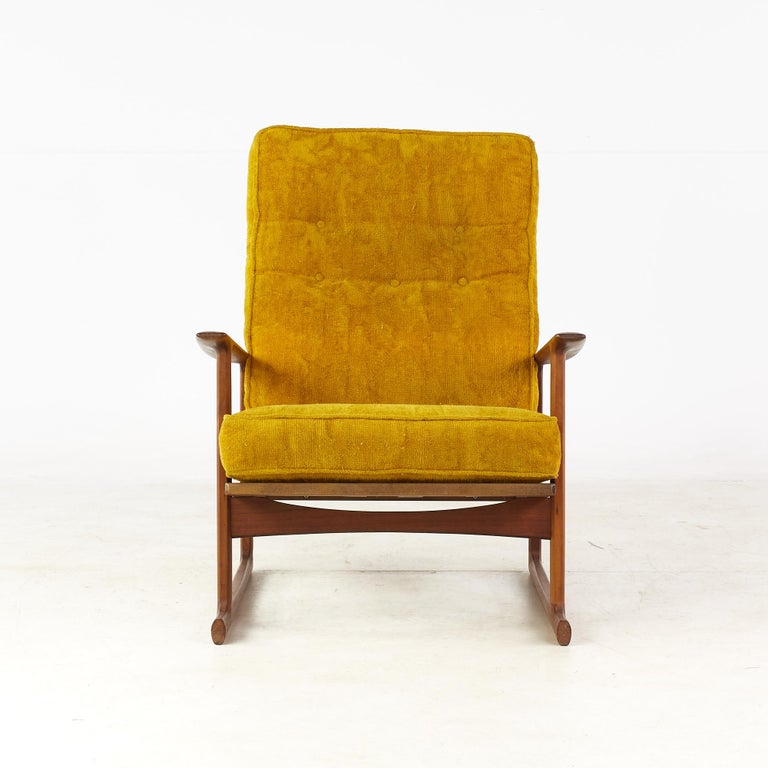 Kofod Larsen for Selig Mid Century Walnut Sleigh Leg High Back Lounge Chair

This chair measure: 29 wide x 41 deep x 37 inches high, with a seat height of 14 and arm height/chair clearance of 21 inches

All pieces of furniture can be had in what we