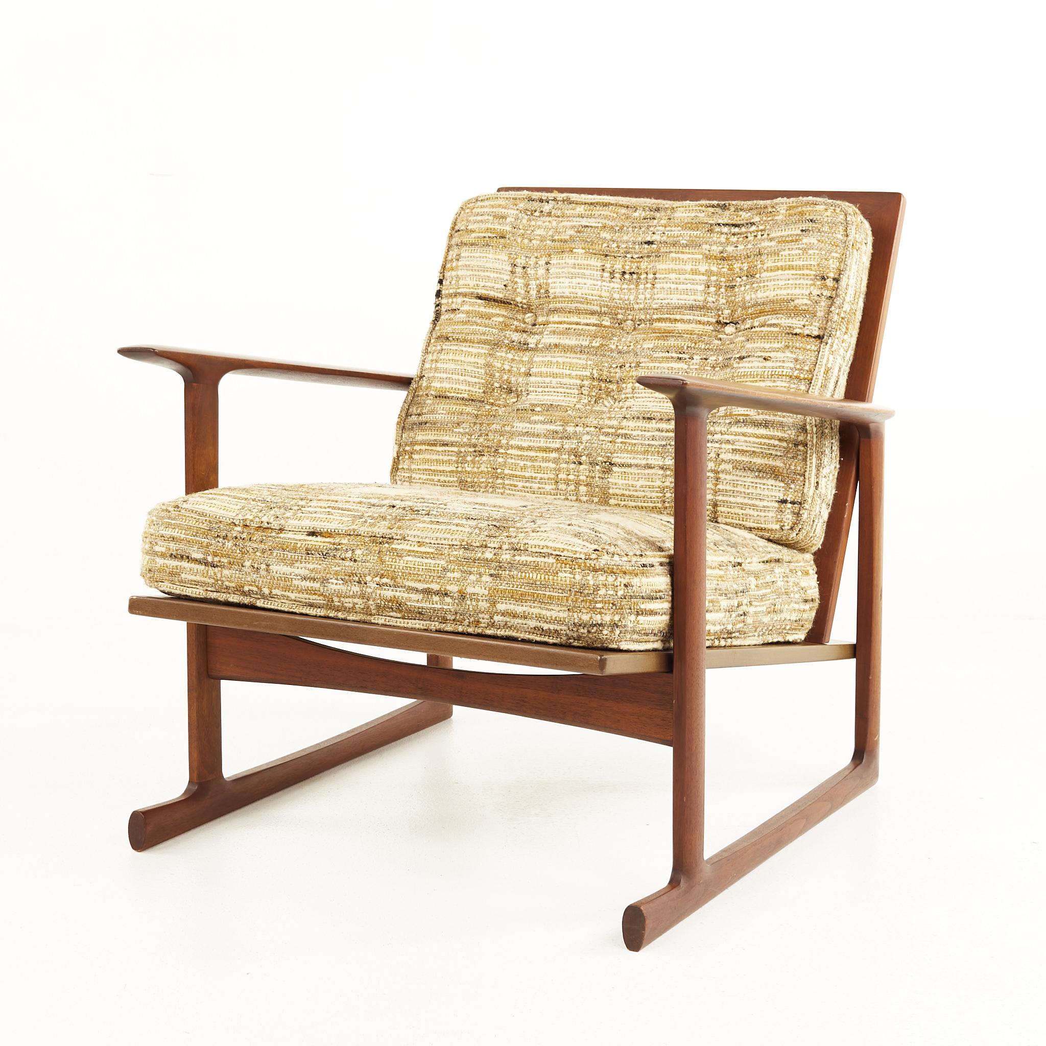 American Kofod Larsen for Selig Mid Century Teak Sleigh Leg Lounge Chairs - A Pair