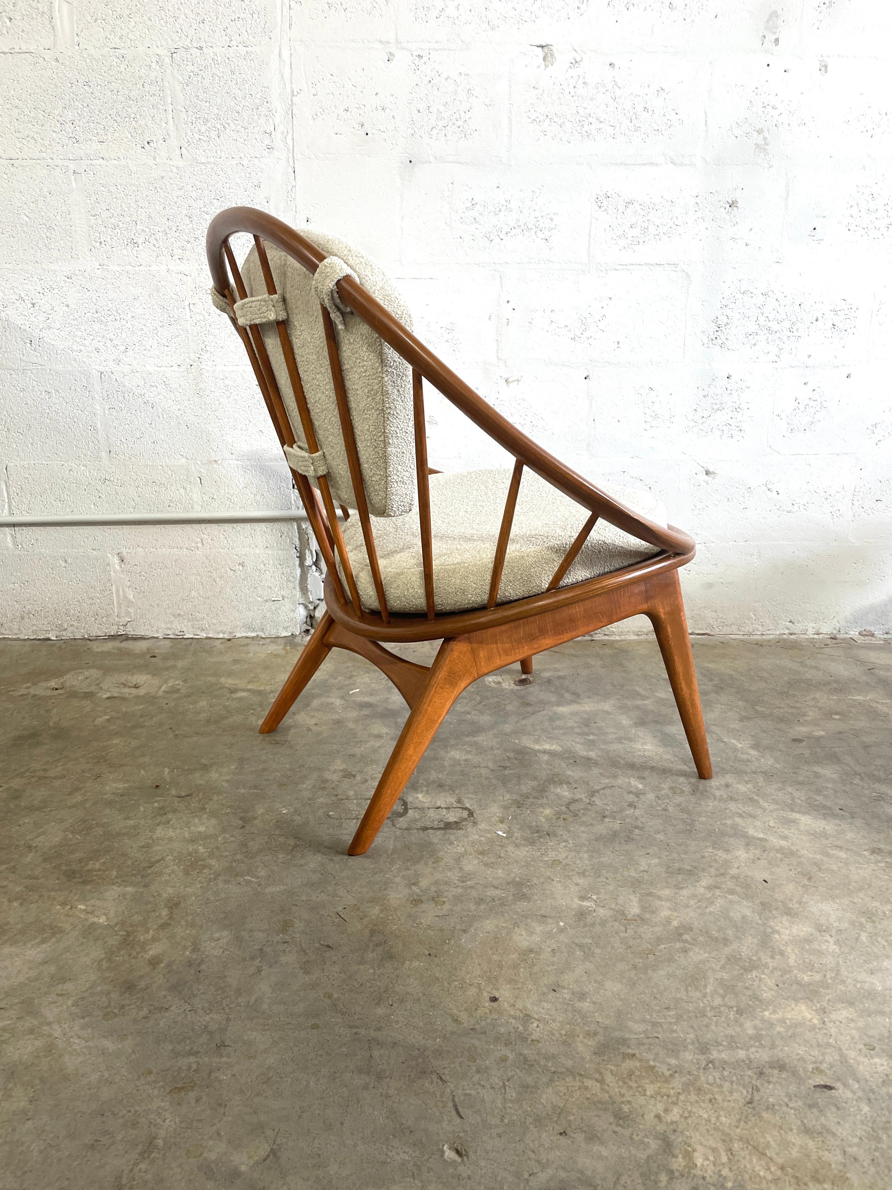 Danish Mid Century Modern Ib Kofod Larsen “Hoop” Lounge Chair. Recently recovered in boucle. Refinished. 