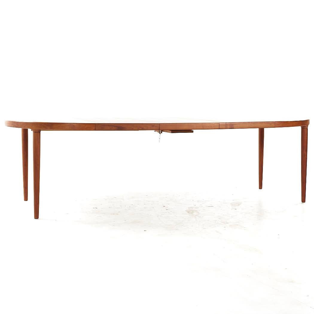 SOLD 07/31/23 Kofod Larsen MCM Danish Teak Expanding Dining Table with 3 Leaves For Sale 8