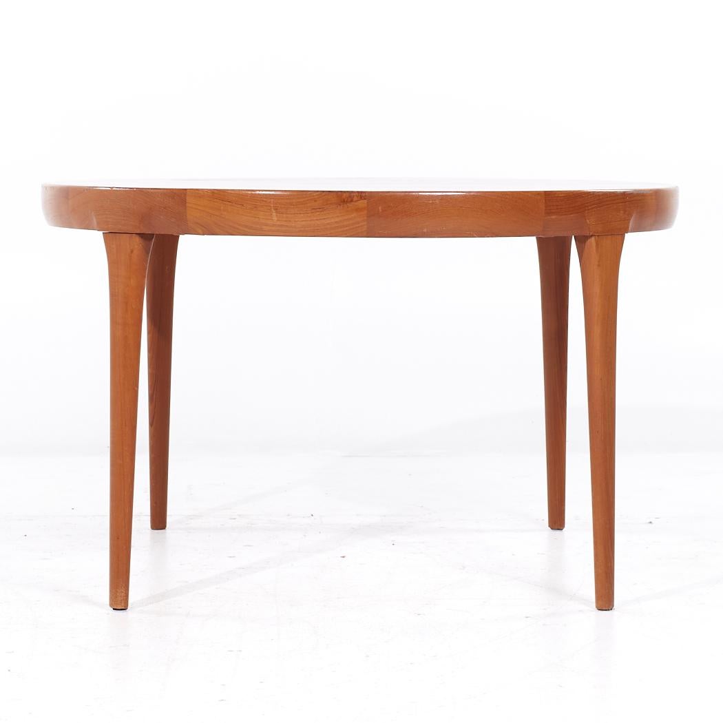 Late 20th Century Kofod Larsen Mid Century Danish Teak Expanding Dining Table with 3 Leaves For Sale