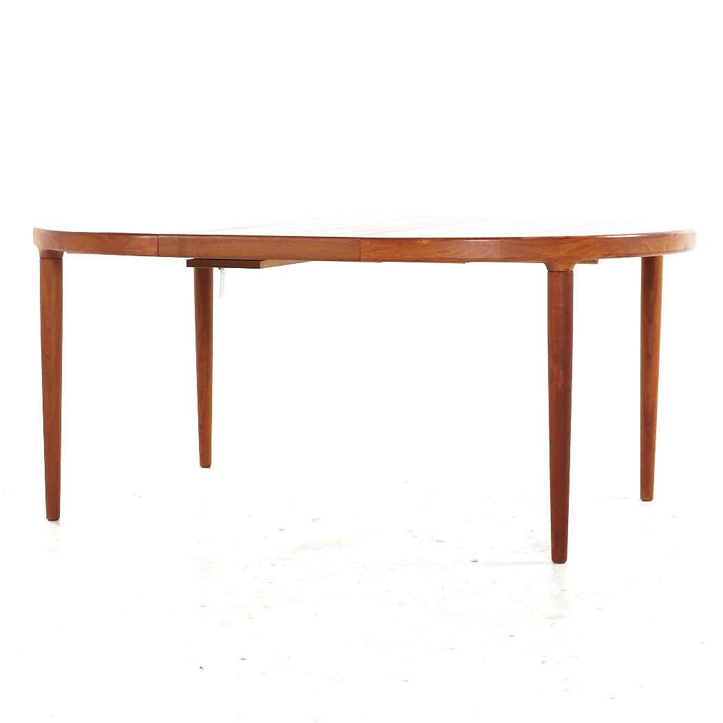 SOLD 07/31/23 Kofod Larsen MCM Danish Teak Expanding Dining Table with 3 Leaves For Sale 4