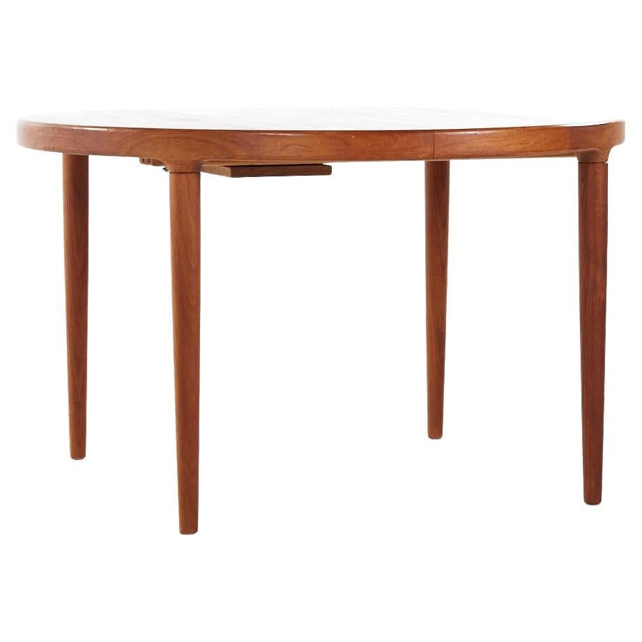 SOLD 07/31/23 Kofod Larsen MCM Danish Teak Expanding Dining Table with 3 Leaves