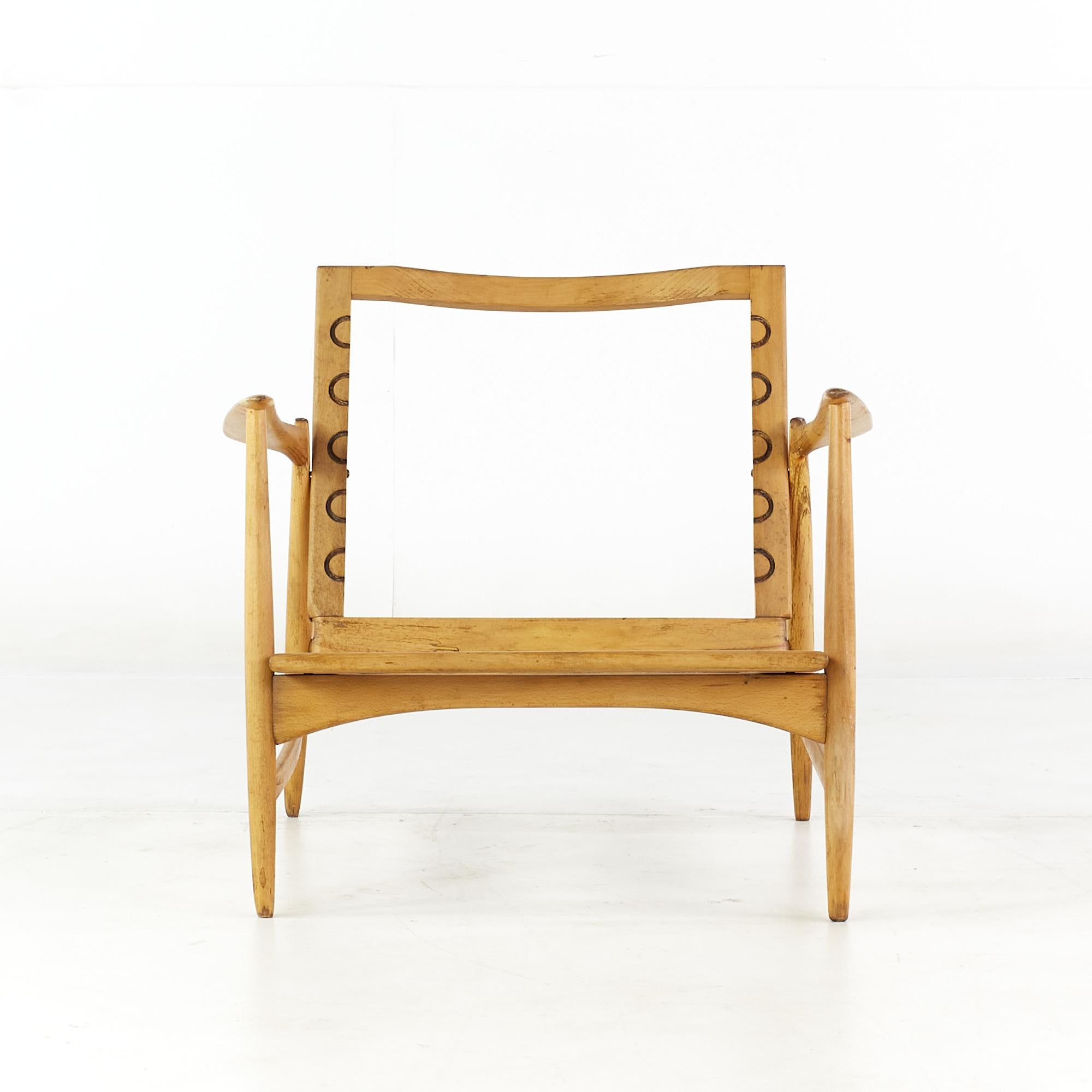Kofod Larsen mid century danish walnut lounge chair frame

This chair measures: 30 wide x 33 deep x 26.5 high, with a seat height of 12 and arm height/chair clearance 22.5 inches
(The seat height measurement will increase once cushions are