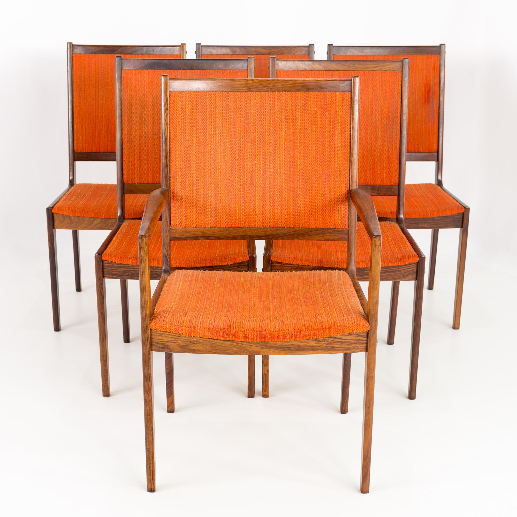 Kofod Larsen mid-century rosewood highback dining chairs - set of 6.

Each chair measures: 23.75 wide x 21.75 deep x 37.5 high, with a seat height of 17.75 and arm height of 25.75 inches.

All pieces of furniture can be had in what we call
