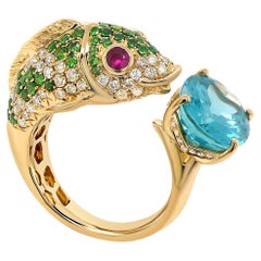 Anello in oro giallo 18K con apatite blu, rubino, diamanti e granati verdi