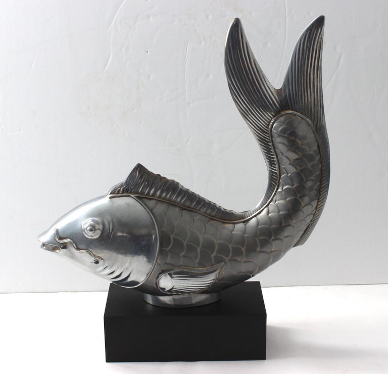 Sold at Auction: PR CARVED FISH BOOKENDS
