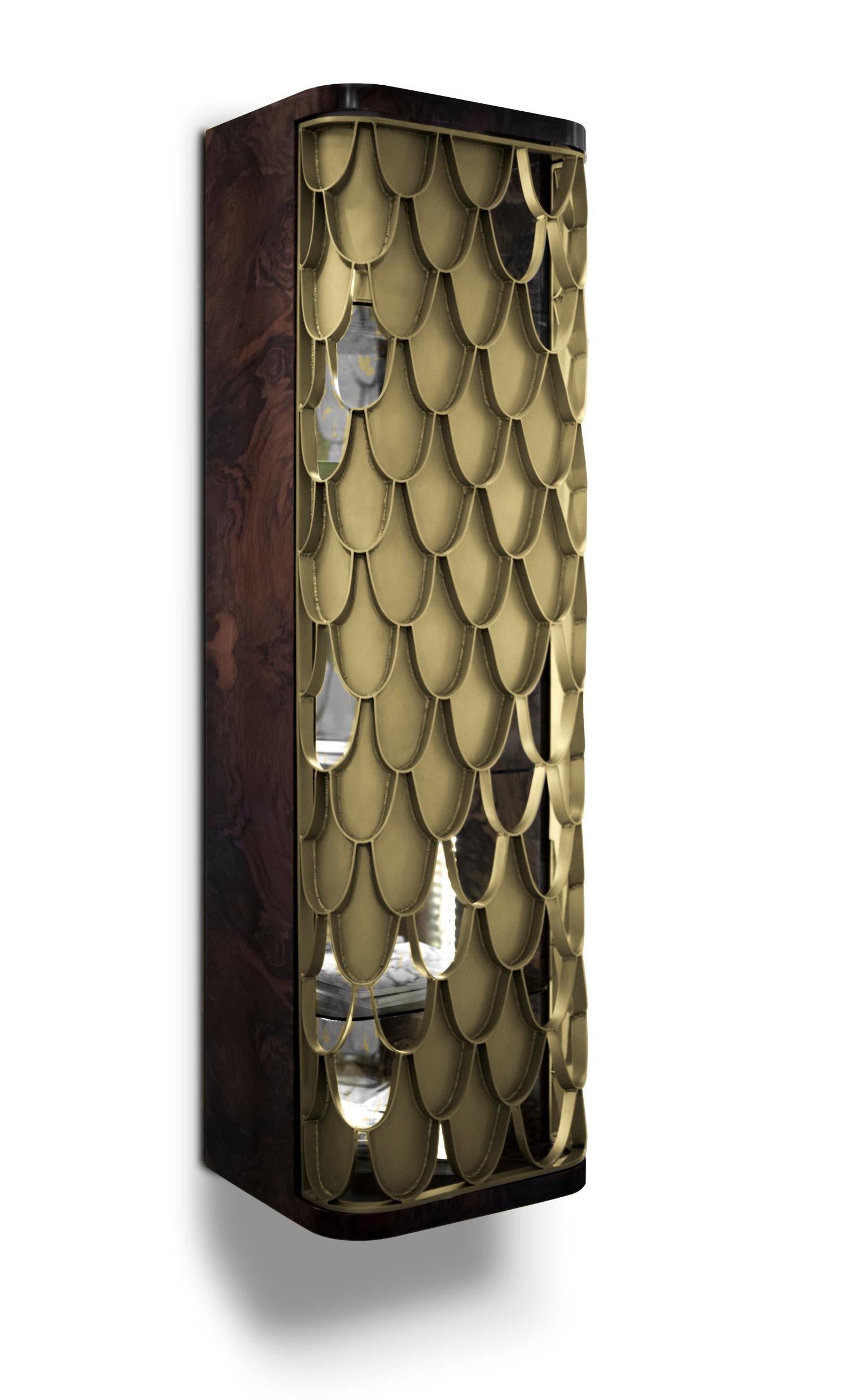 Koi Tall Storage is another product of our amazing Koi family. Finished with walnut root inside and out and aged brass carps this product is perfect to display your finest accessories. Discreet yet exquisite, this tall storage provides you