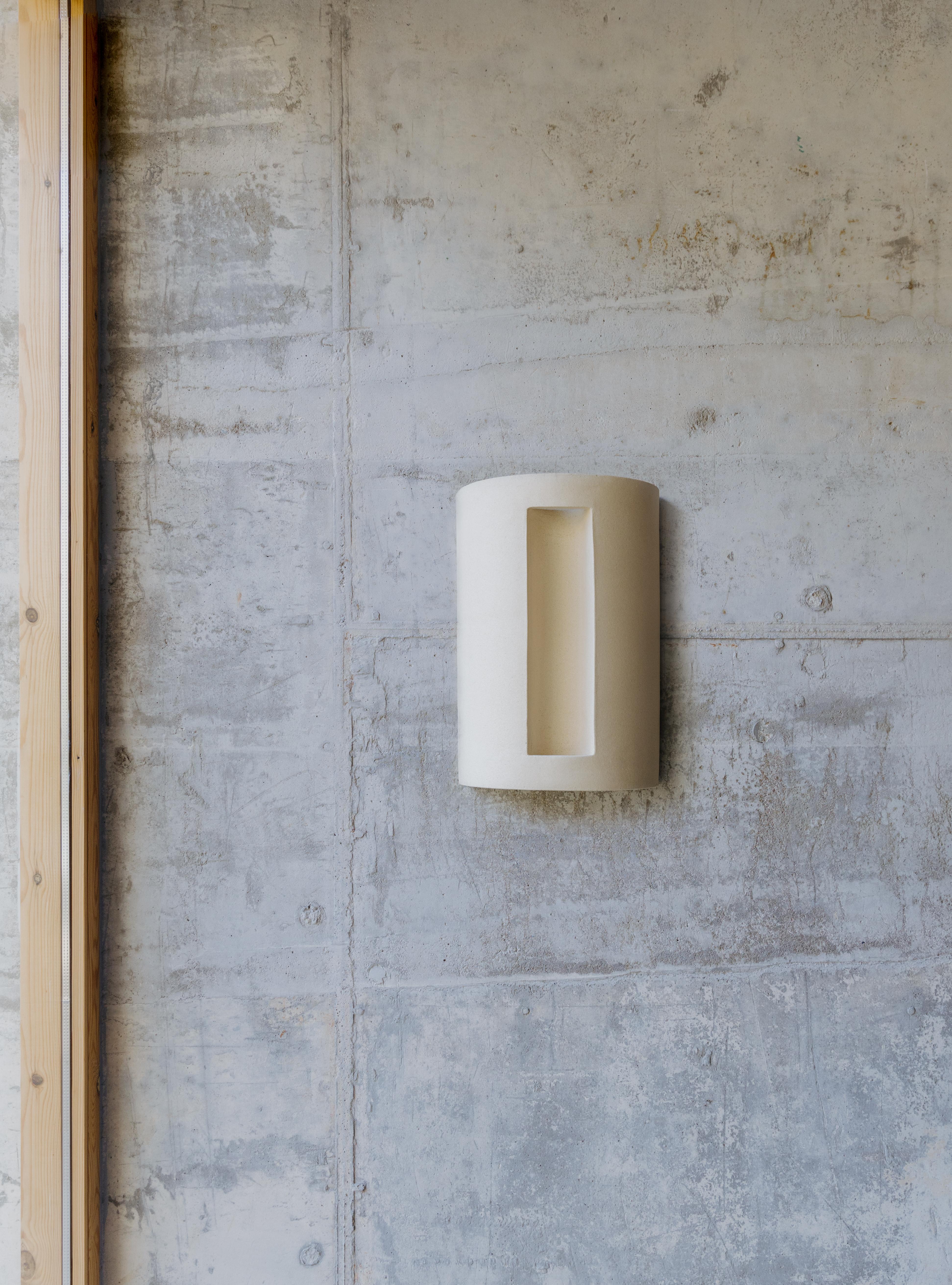 Koilos wall light by Lisa Allegra
Dimensions: W 22 x D 14 x H 32 cm
Materials: Clay

Born in 1986 in Paris, Lisa Allegra has earned in 2010 a degree in furniture design from the École Supérieure des Arts Décoratifs. She has worked for Tsé&Tsé