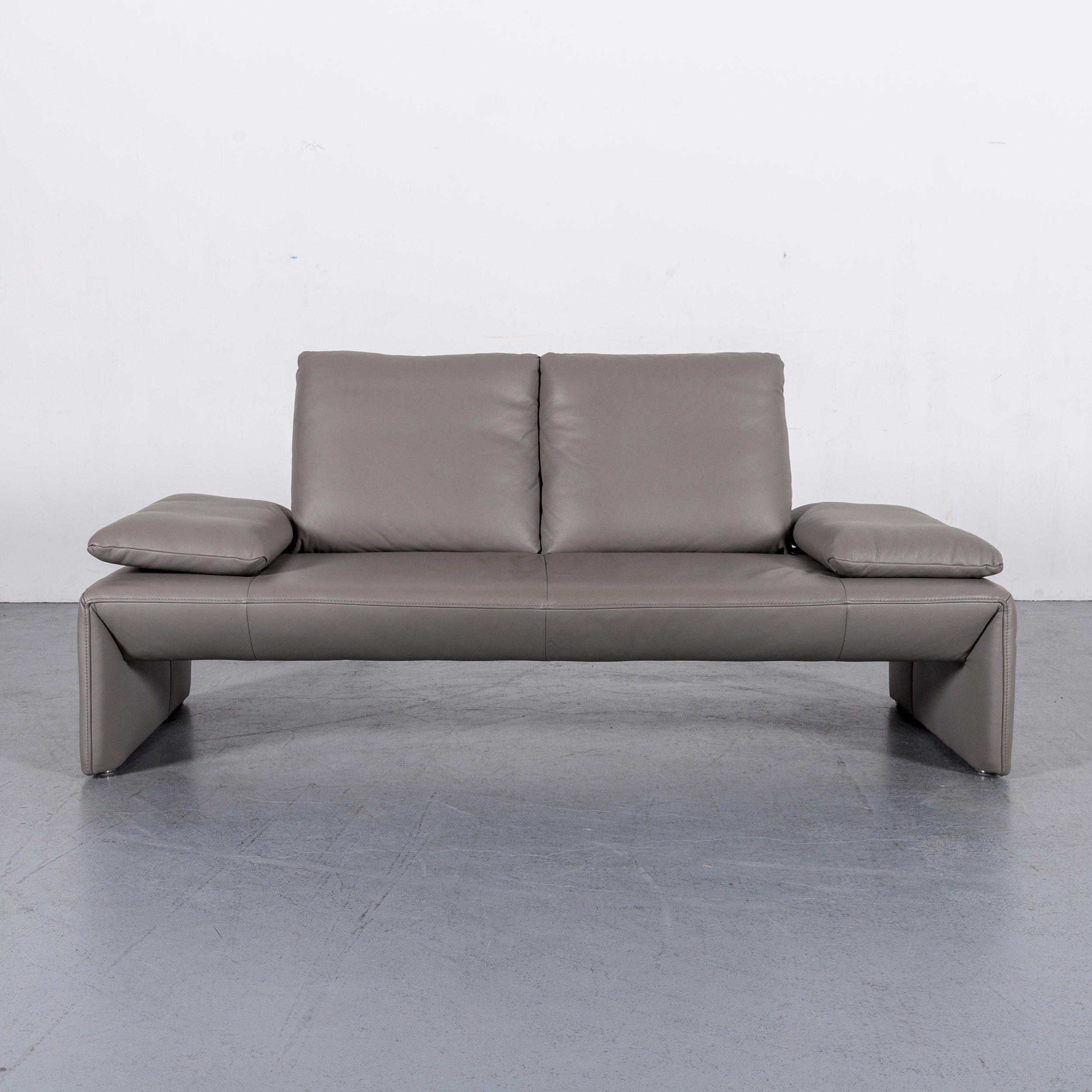 We bring to you a Koinor designer leather sofa grey two-seat couch.