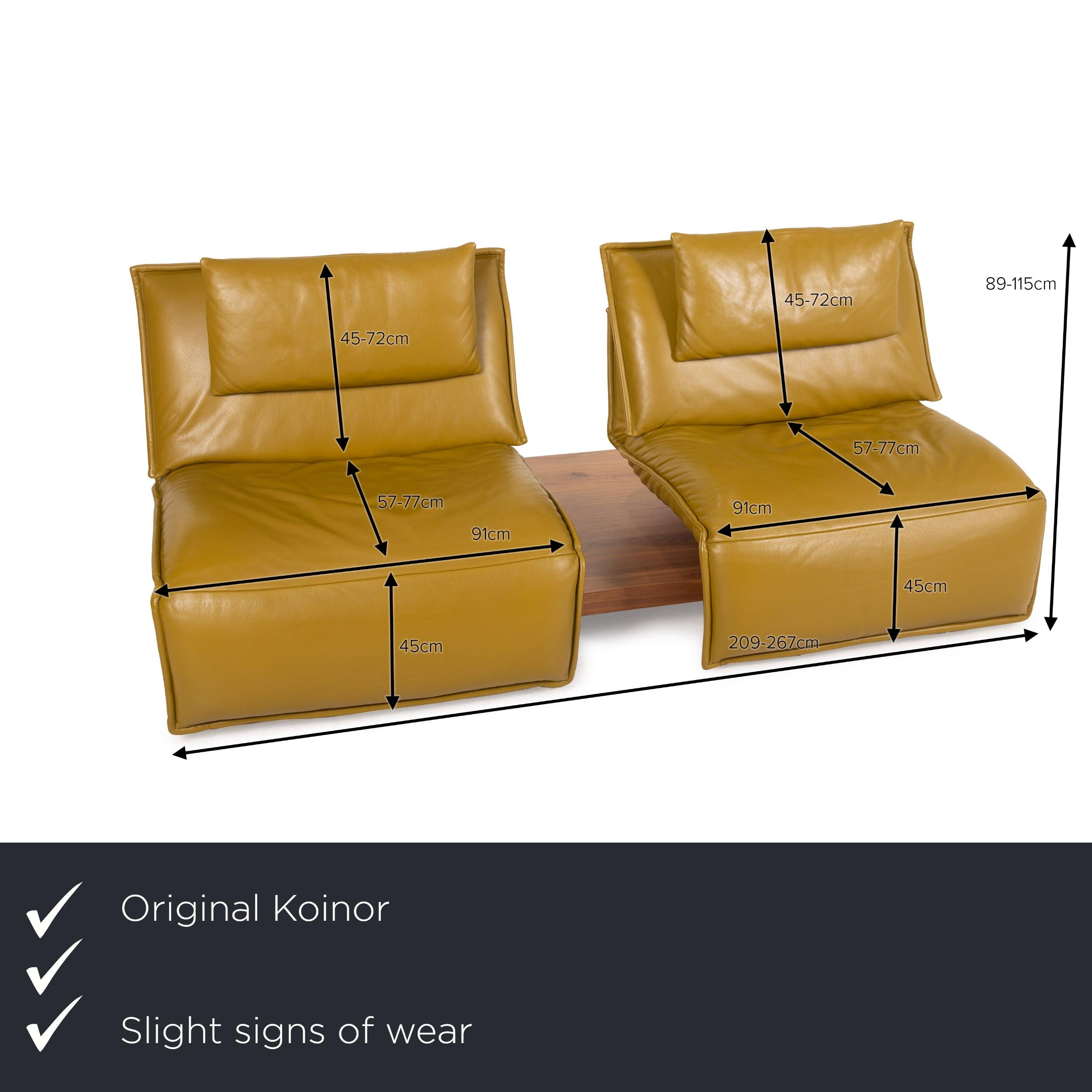 We present to you a Koinor free motion edit leather sofa green two seater yellow wood couch with.
 

 Product measurements in centimeters:
 

Depth: 108
Width: 209
Height: 89
Seat height: 45
Seat depth: 57
Seat width: 91
Back height: