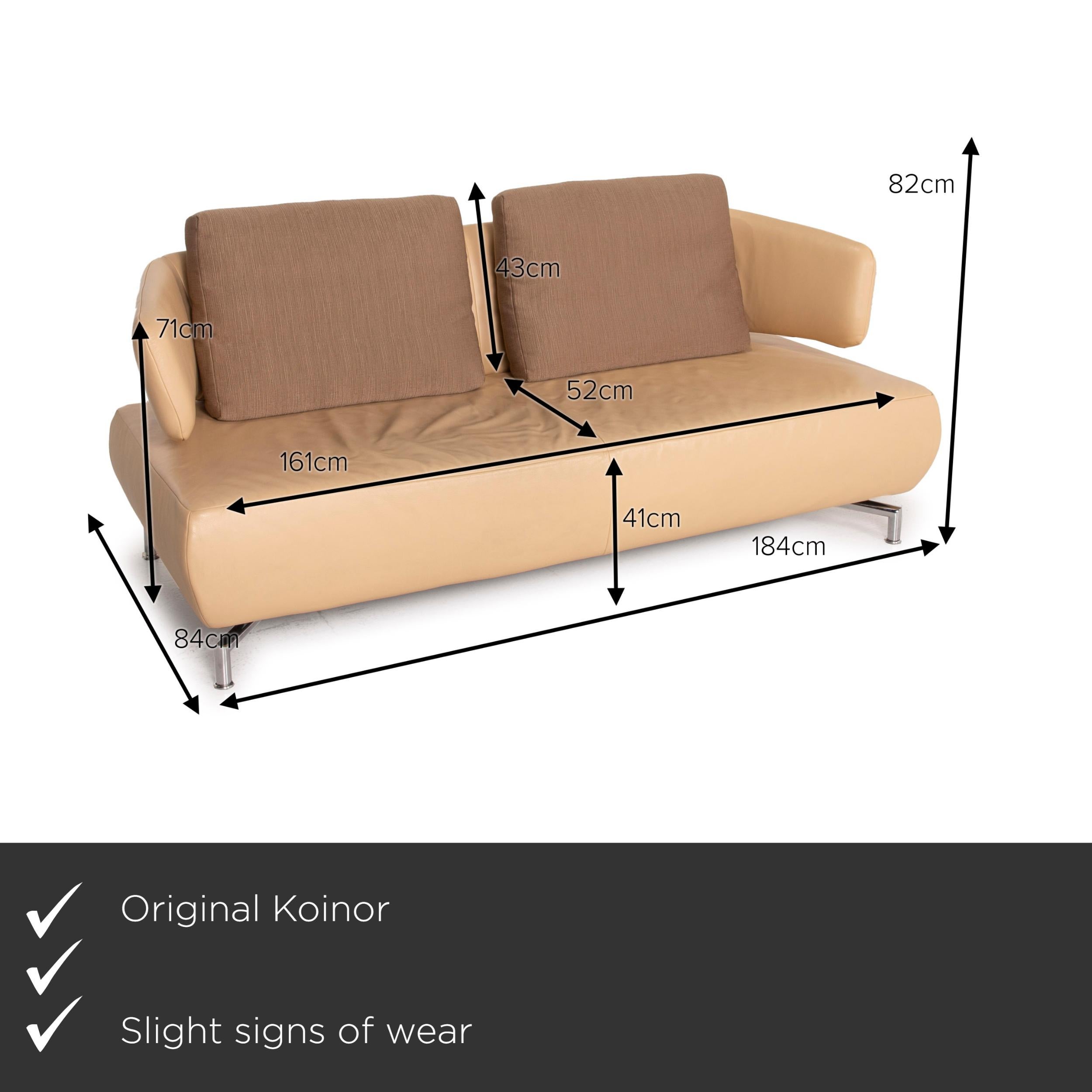 We present to you a Koinor leather sofa beige two-seater fabric.
  
 

 Product measurements in centimeters:
 

Depth: 84
Width: 184
Height: 82
Seat height: 41
Rest height: 71
Seat depth: 52
Seat width: 161
Back height: 43.