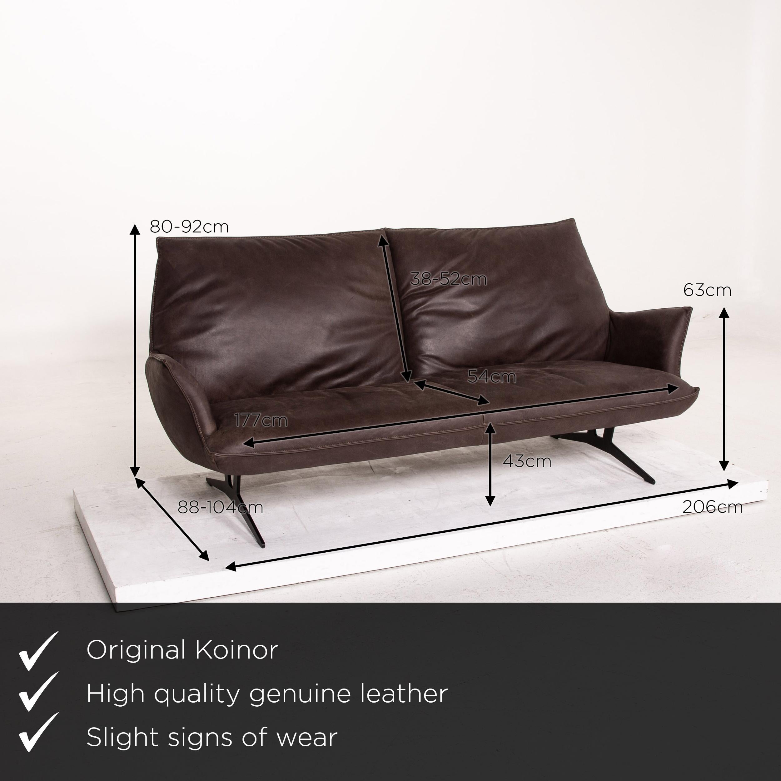 We present to you a Koinor leather sofa brown dark brown three-seat function couch.


 Product measurements in centimeters:
 

Depth 88
Width 206
Height 92
Seat height 43
Rest height 63
Seat depth 54
Seat width 177
Back height 52.
  