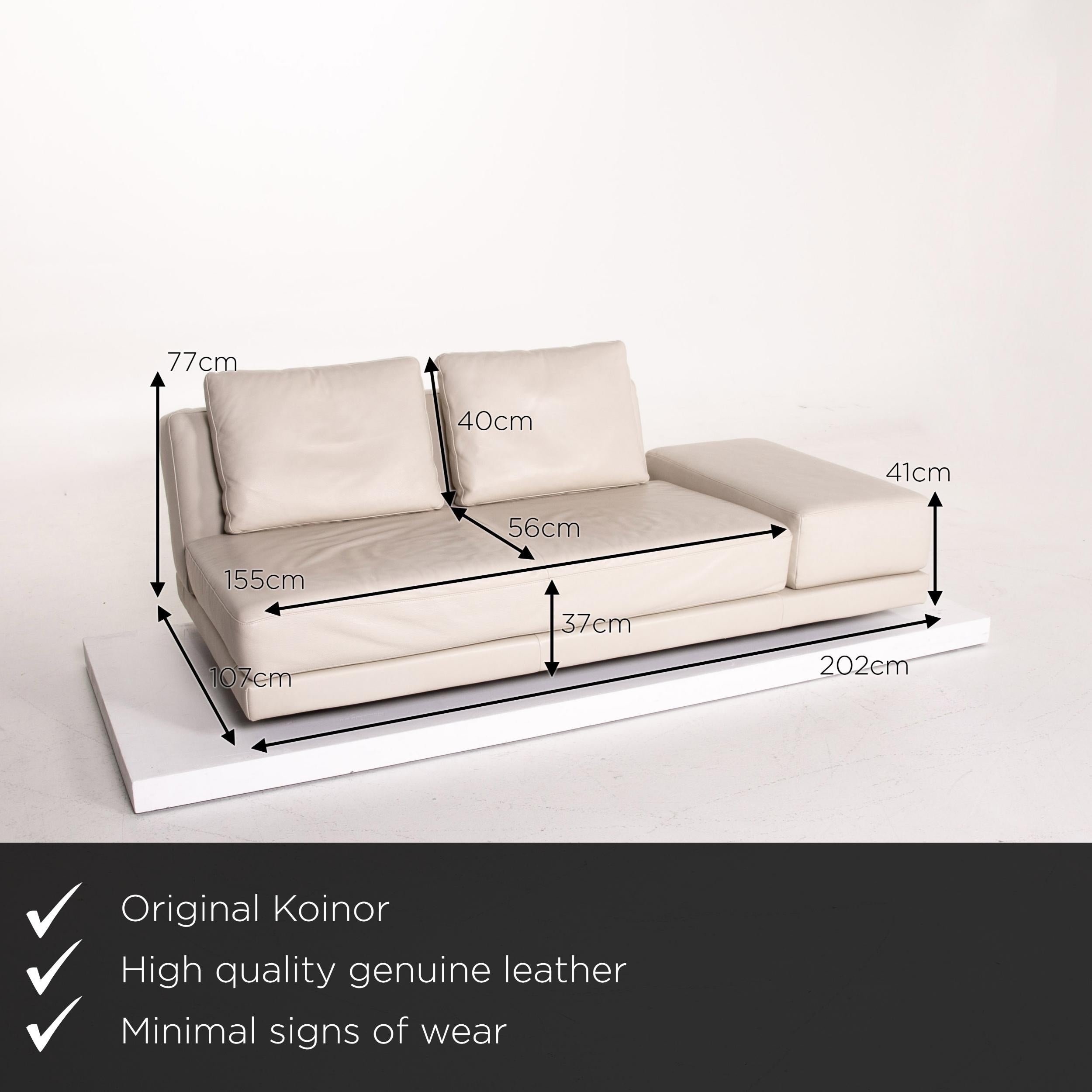 We present to you a Koinor leather sofa cream three-seat function couch.
 

 Product measurements in centimeters:
 

Depth 107
Width 202
Height 77
Seat height 37
Rest height 41
Seat depth 56
Seat width 155
Back height 40.
 