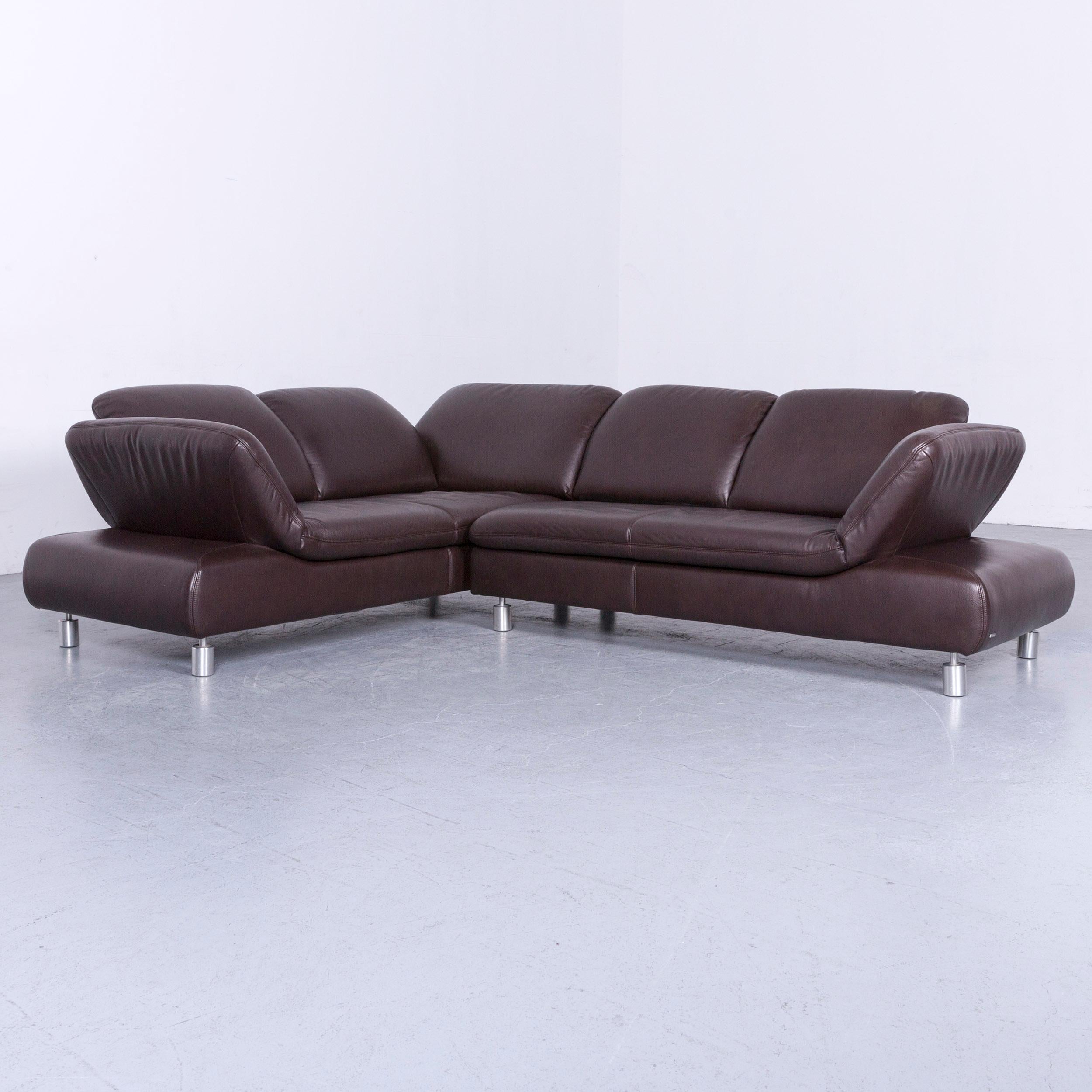 We bring to you an Koinor Rivoli designer leather corner sofa in brown with functions. 















