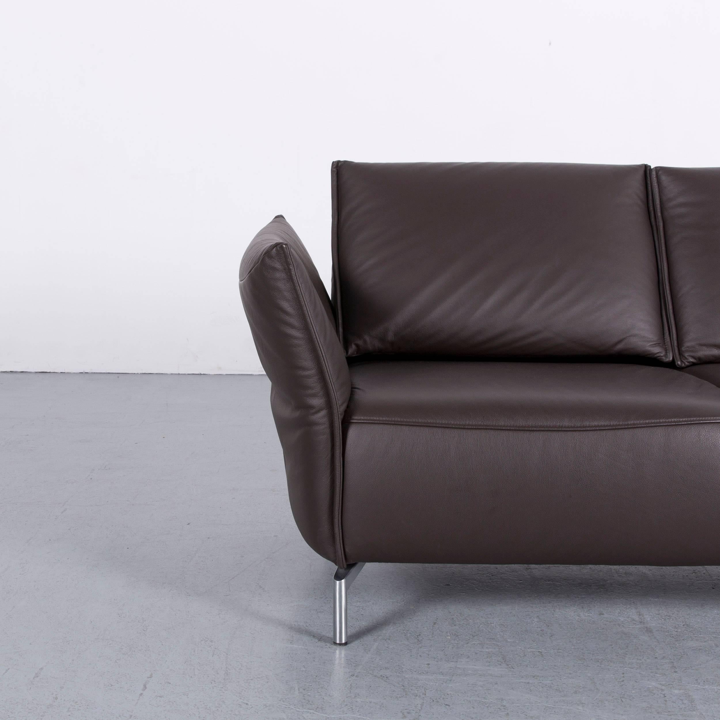 We bring to you an Koinor Vanda two-seat sofa brown leather function.































