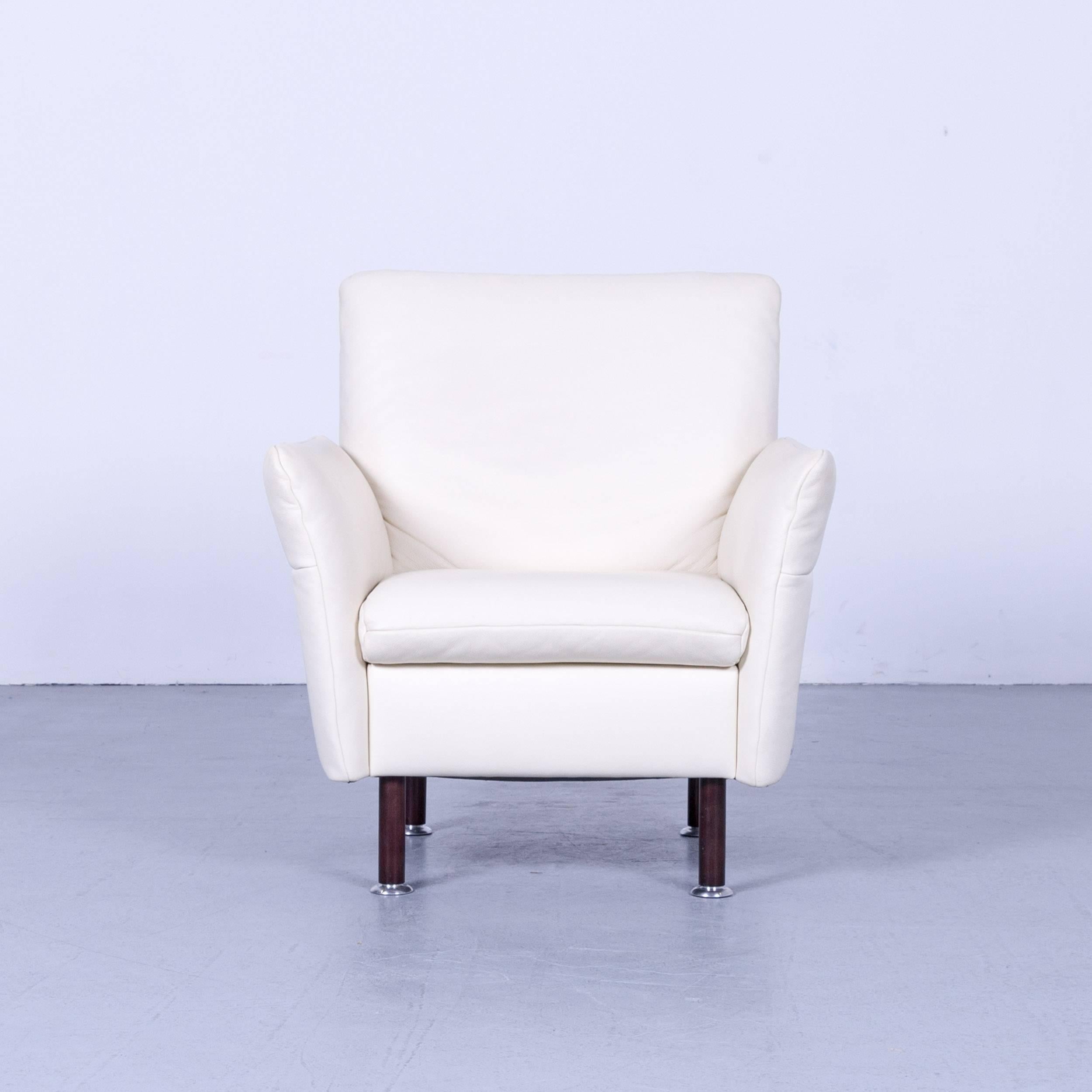 Koinor Vittoria designer leather armchair in crème white with functions, made for pure comfort and style.