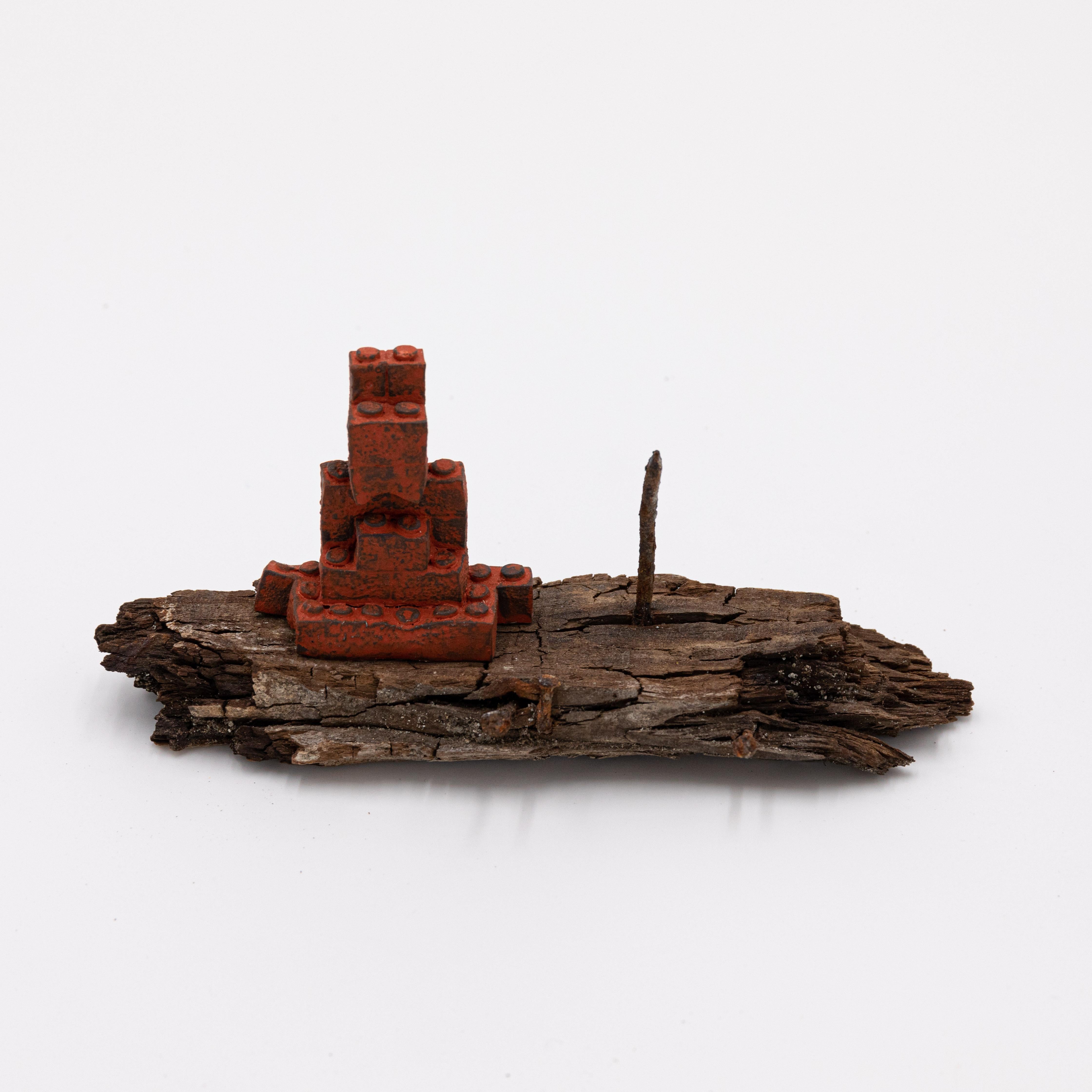 Lego, discarded wood, gilder’s bole

This work was created for an exhibit as part of the artistic unit SHIKŌ, a collaborative effort between sculptors Kanji Hasegawa, Isaji Yugo, and Kojun.

The pieces transform everyday items into alters, reminding