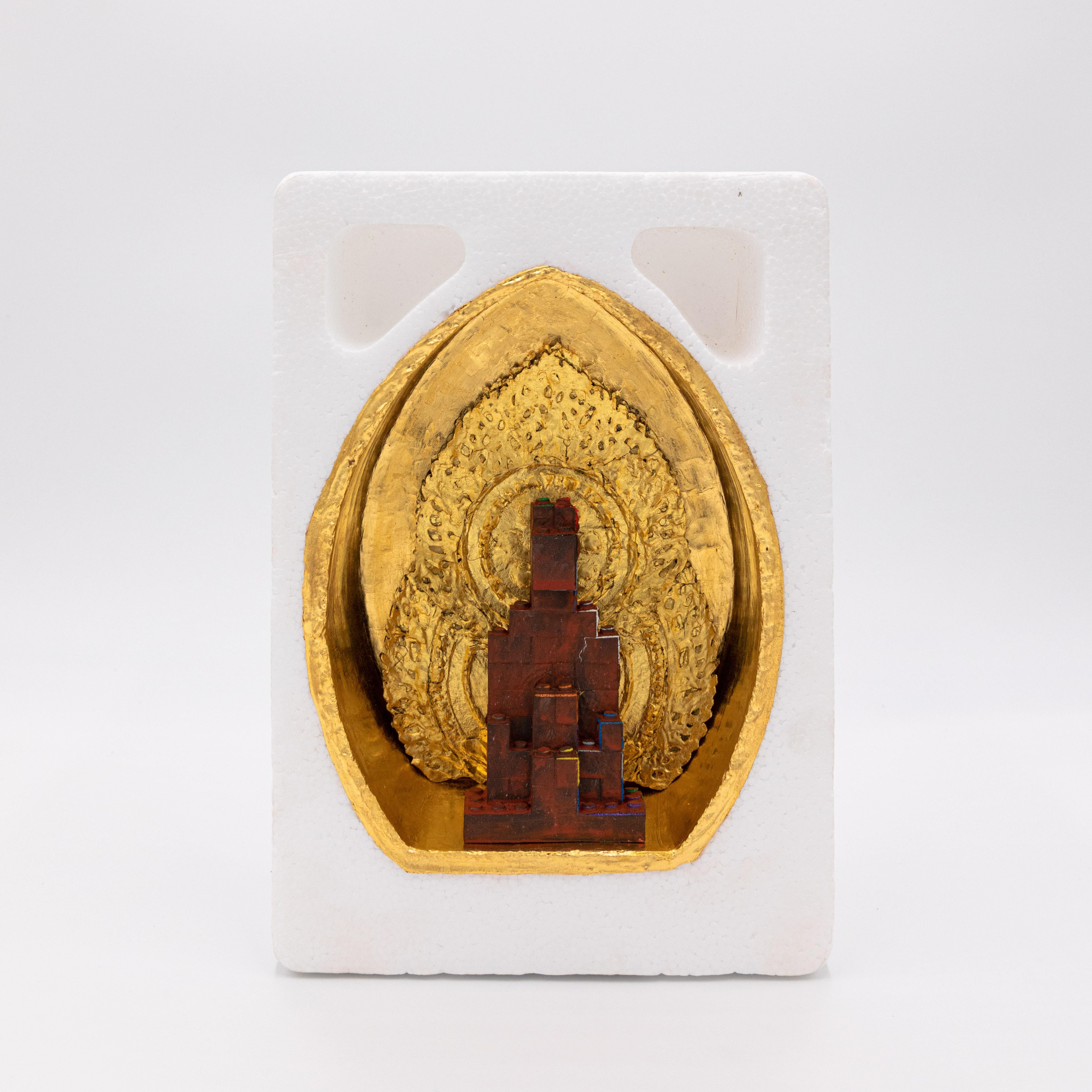 Lego, gold leaf, Styrofoam, paper, cardboard, gilder’s bole

This work was created for an exhibit as part of the artistic unit SHIKŌ, a collaborative effort between sculptors Kanji Hasegawa, Isaji Yugo, and Kojun.

The pieces transform everyday