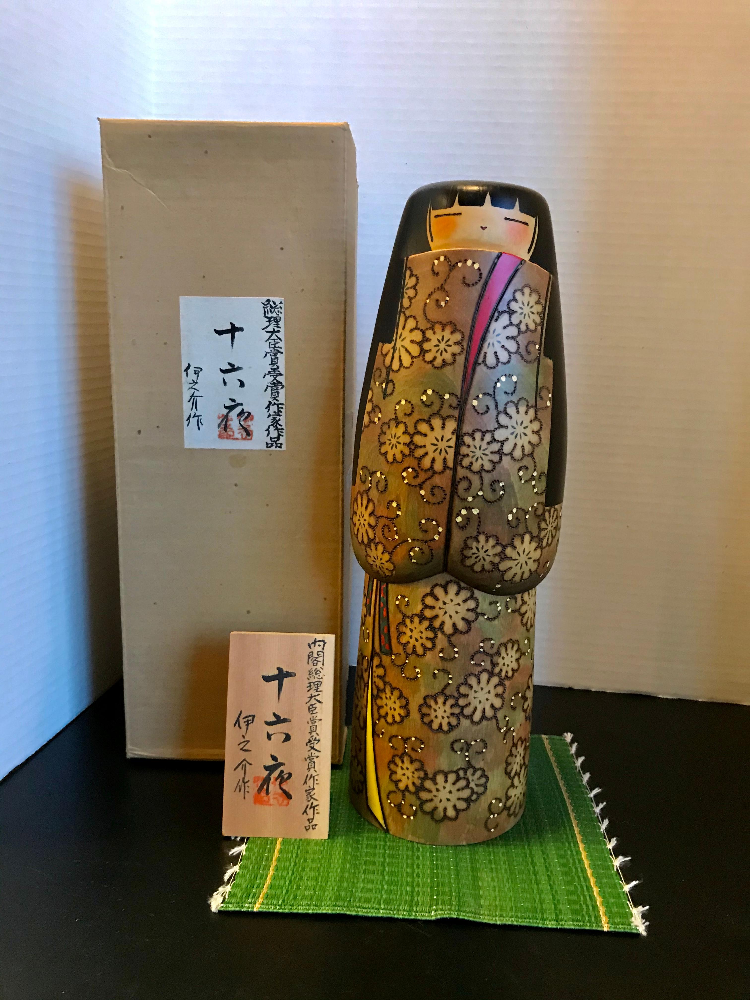 Kokeshi dolls in olden days were toys for children in Northen Japan which parents would gift to a new born child. Woods from the north of Japan would be used for the Kokeshi and a lathe and a plane would be used to create the body and head. The most