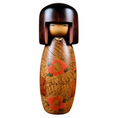 Kokeshi with Camellias, by Inosuke Kobayashi, Japan, 1990s