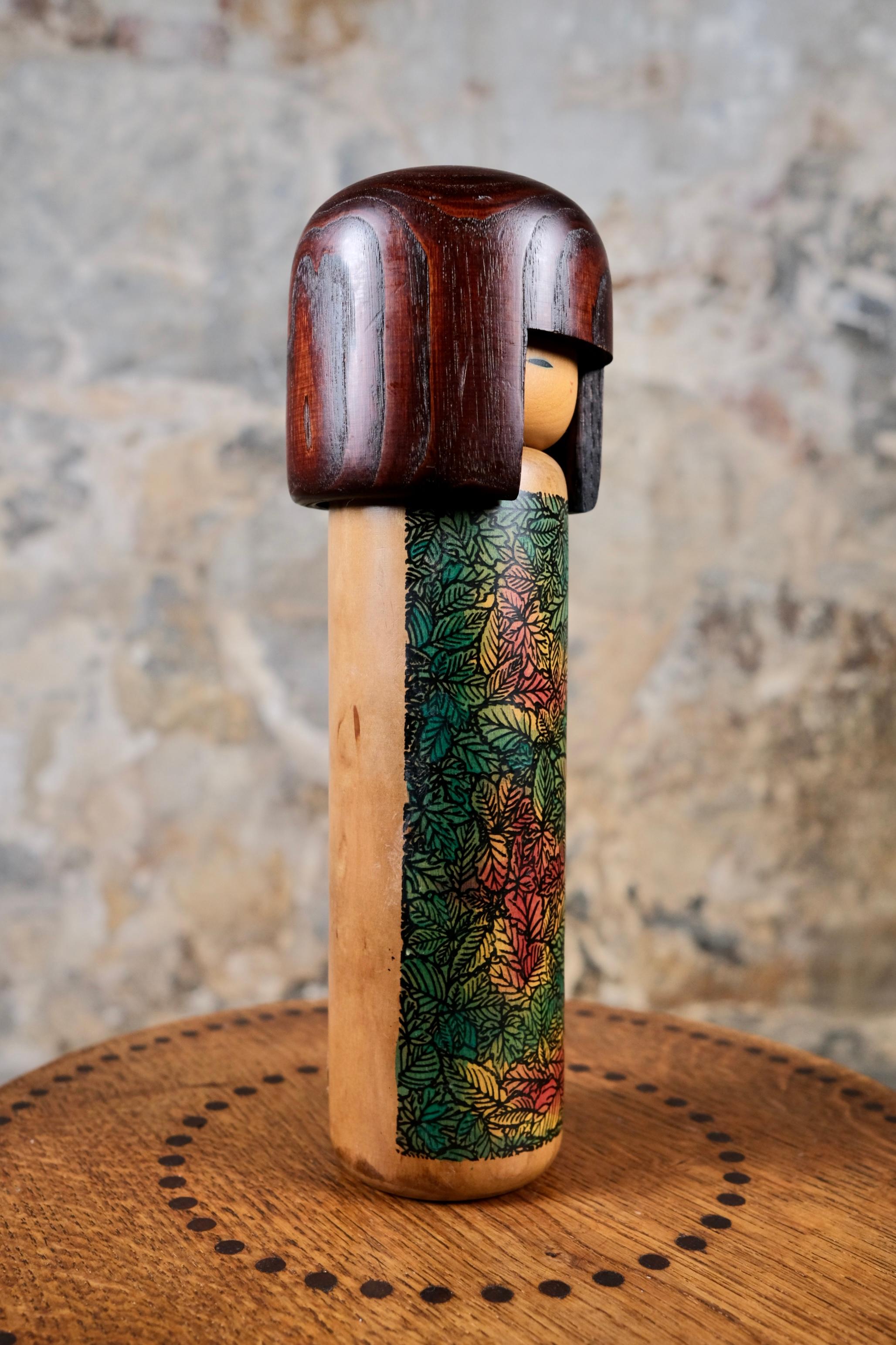 Late 20th Century Kokeshi with leaves by Usaburo, Japan, 1990s For Sale