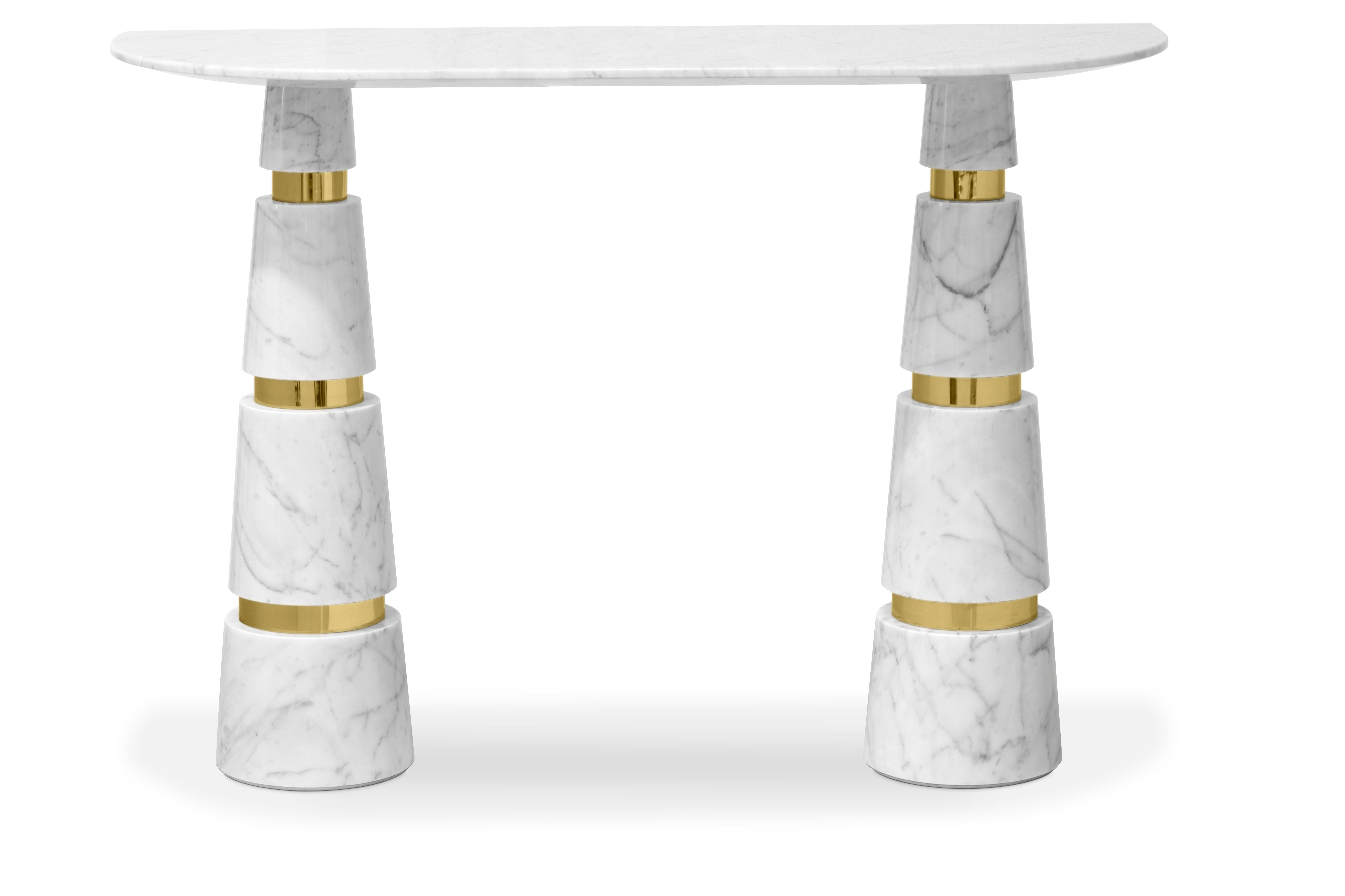 Drawing you in with a luxurious white-and-gray marble and striking conal legs, the Avalanche console is an icon of contemporary style. The modern shape and elegantly bright whites will bring your interiors into the future, where everything is sleek,
