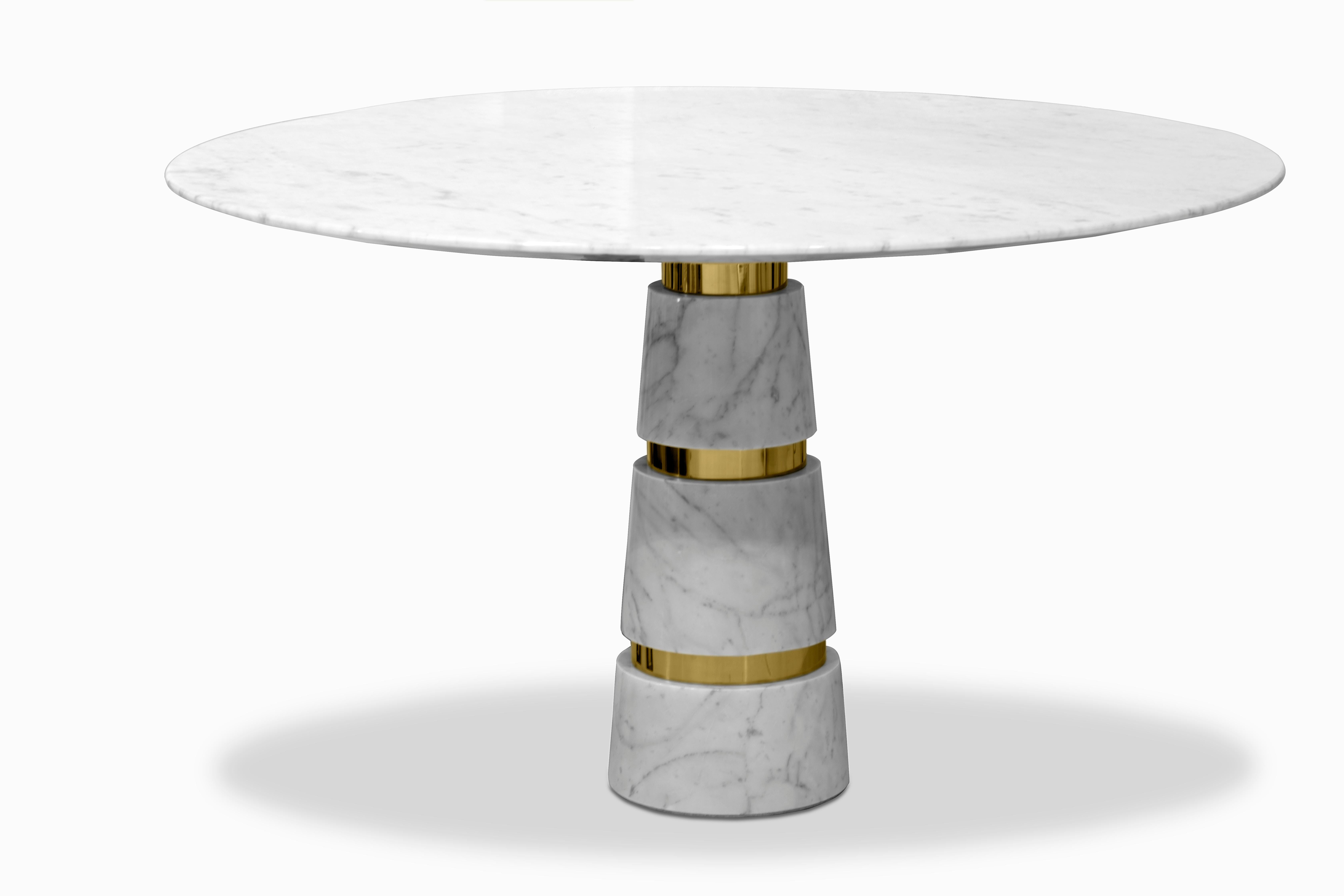 Minimalistic design and minute details, like the glamorous silver bands on the Avalanche leg, bring the Avalanche Dining Table speeding into the future. The broad white marble tabletop reminds you of your life of luxury, while the abstract,
