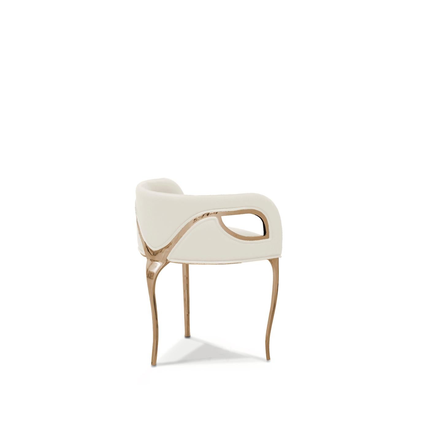 Chandra is both bold and daring. The modern edge in this chair exudes the feeling of vintage glam, while metal bands delicately bind the chair highlighting the sculpted fluidity of the tight back upholstery.

Options
Upholstery: Available in any
