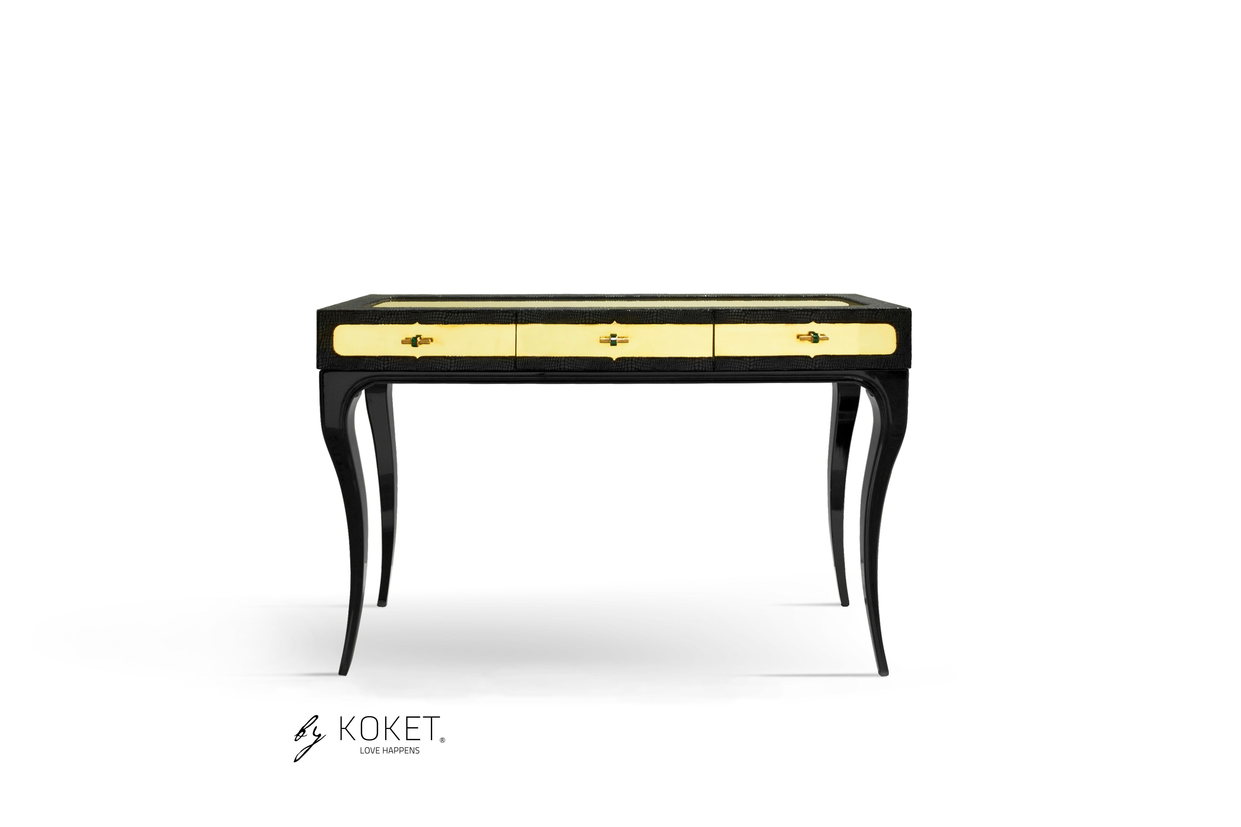 Exuding feelings of fantasy, this highly coveted desk is bold, daring and seductive. Her wooden frame is cloaked in an exotic fabric with a complementing metal top, juxtaposed with the mesmerizing movements of shimmering glass tassels.

Top: