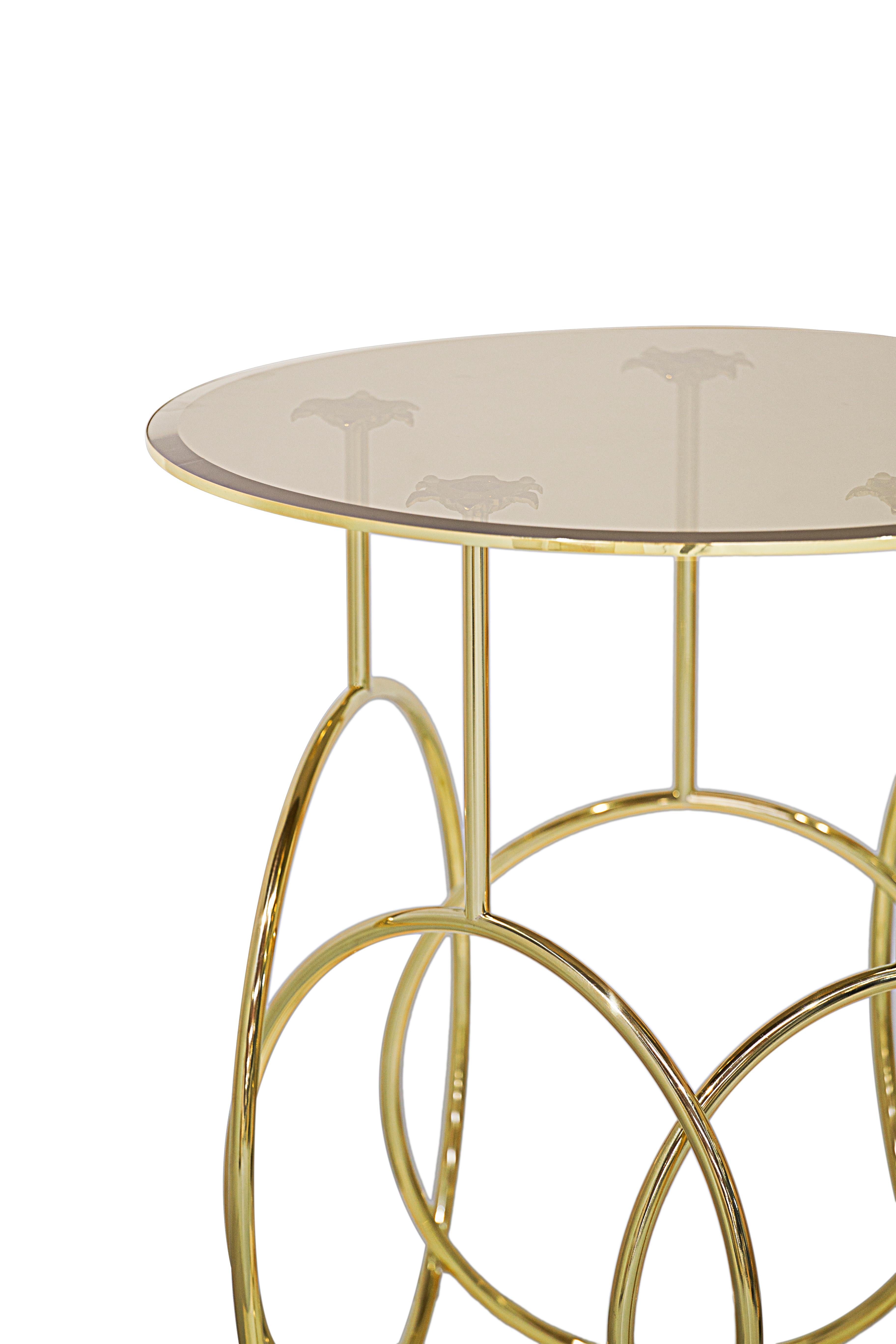 The Kiki side table evokes the romantic and seductive beauty of Parisian cabaret life. The revealing frilled undergarments, the surprise high kicks, the mesmerizing hoops accompanied by blinding splendor give this table a sassy new spin on design.
