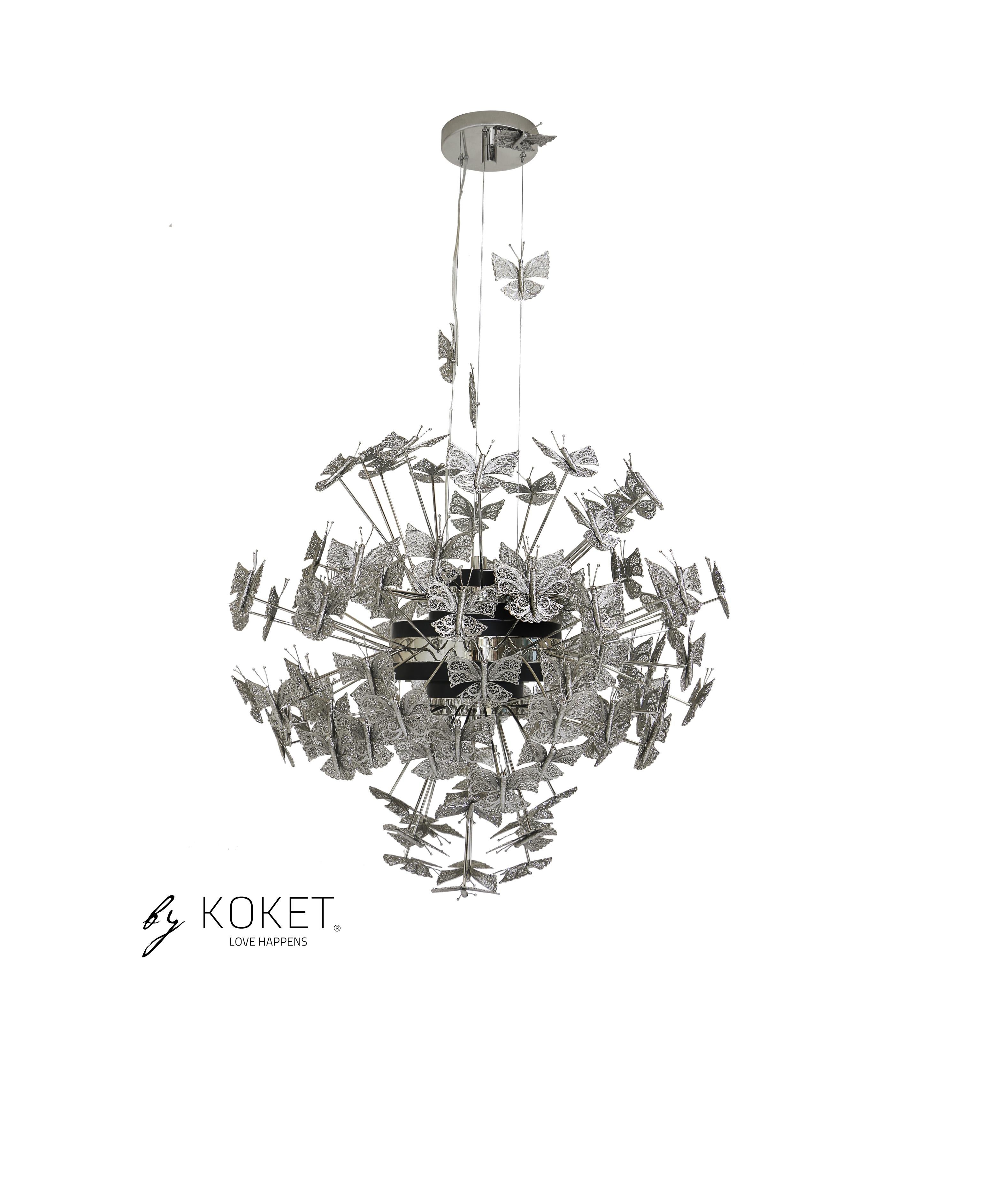 The innocent drama of a whimsical butterfly through the enchanted journey of life. The Nymph chandelier embraces the wild side of this rare and beautiful animal that so gracefully bejewels the lighting fixture. Delicate metal butterflies hover in