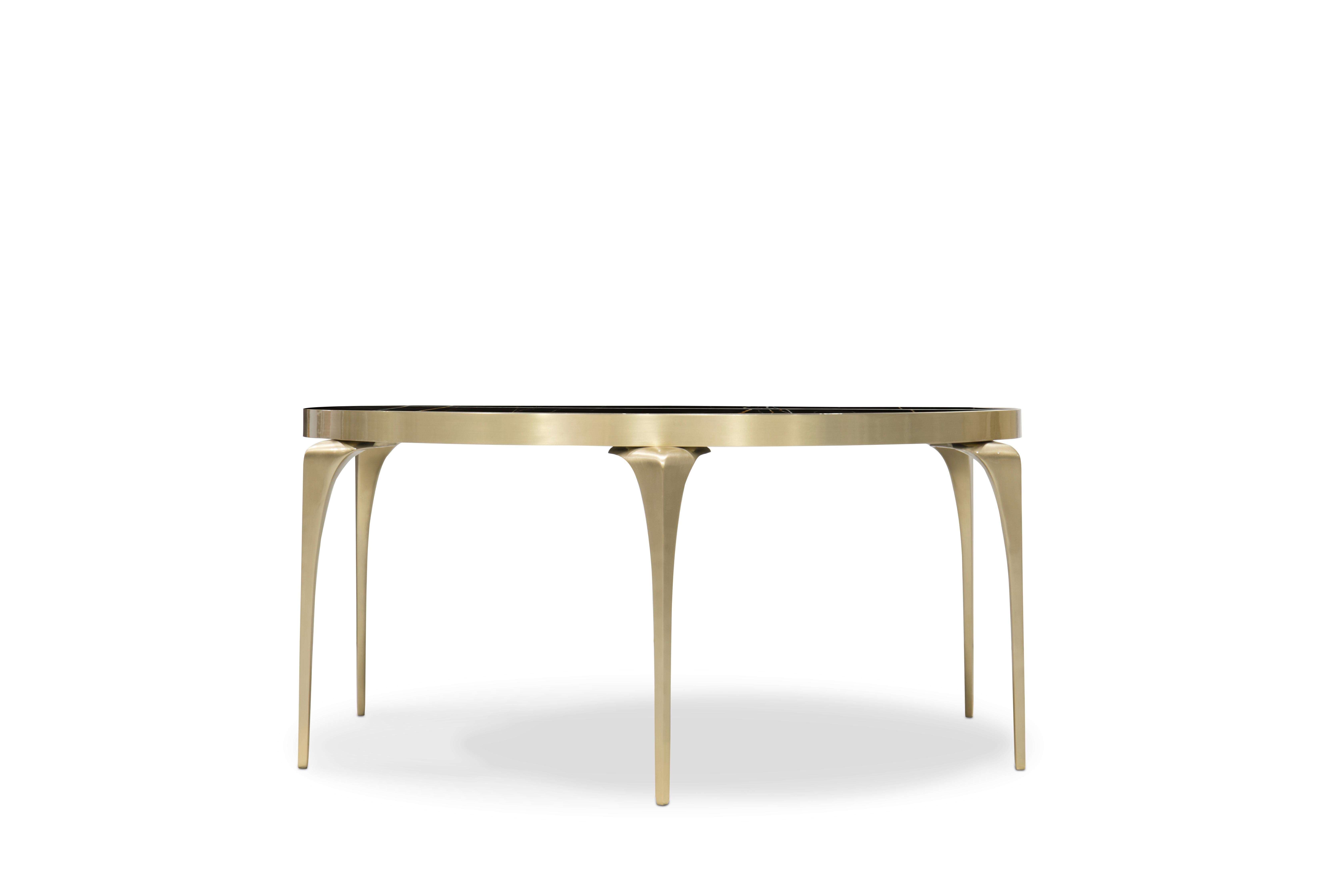 With its lux, polished black Sahara Noir marble top and satin brass legs the Rita cocktail table embodies sophisticated chic style. Simple yet modish, Rita is sure to bring a refined elegance to any room.

Base: Satin brass with high gloss finish