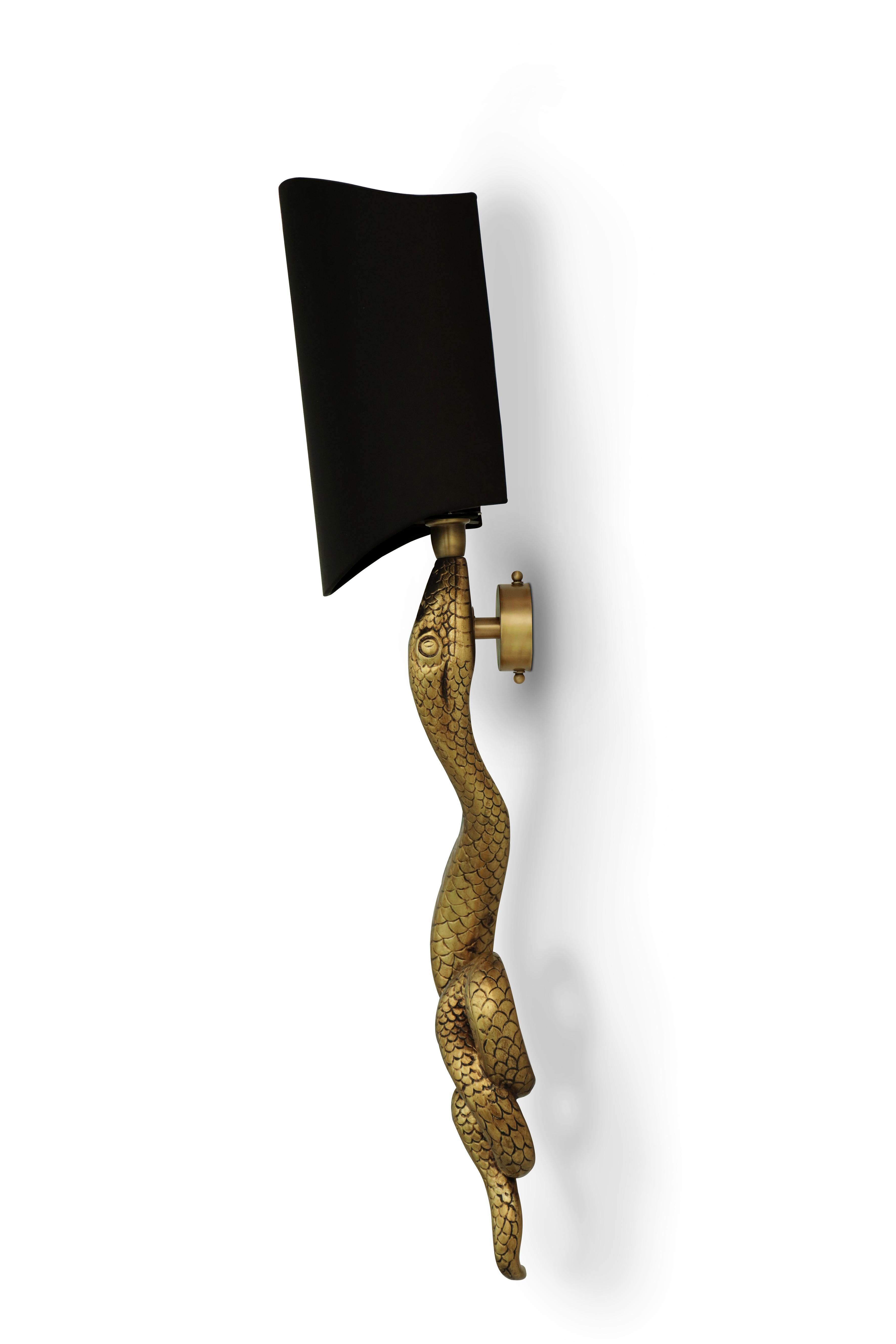 Brass Serpentine Sconce For Sale