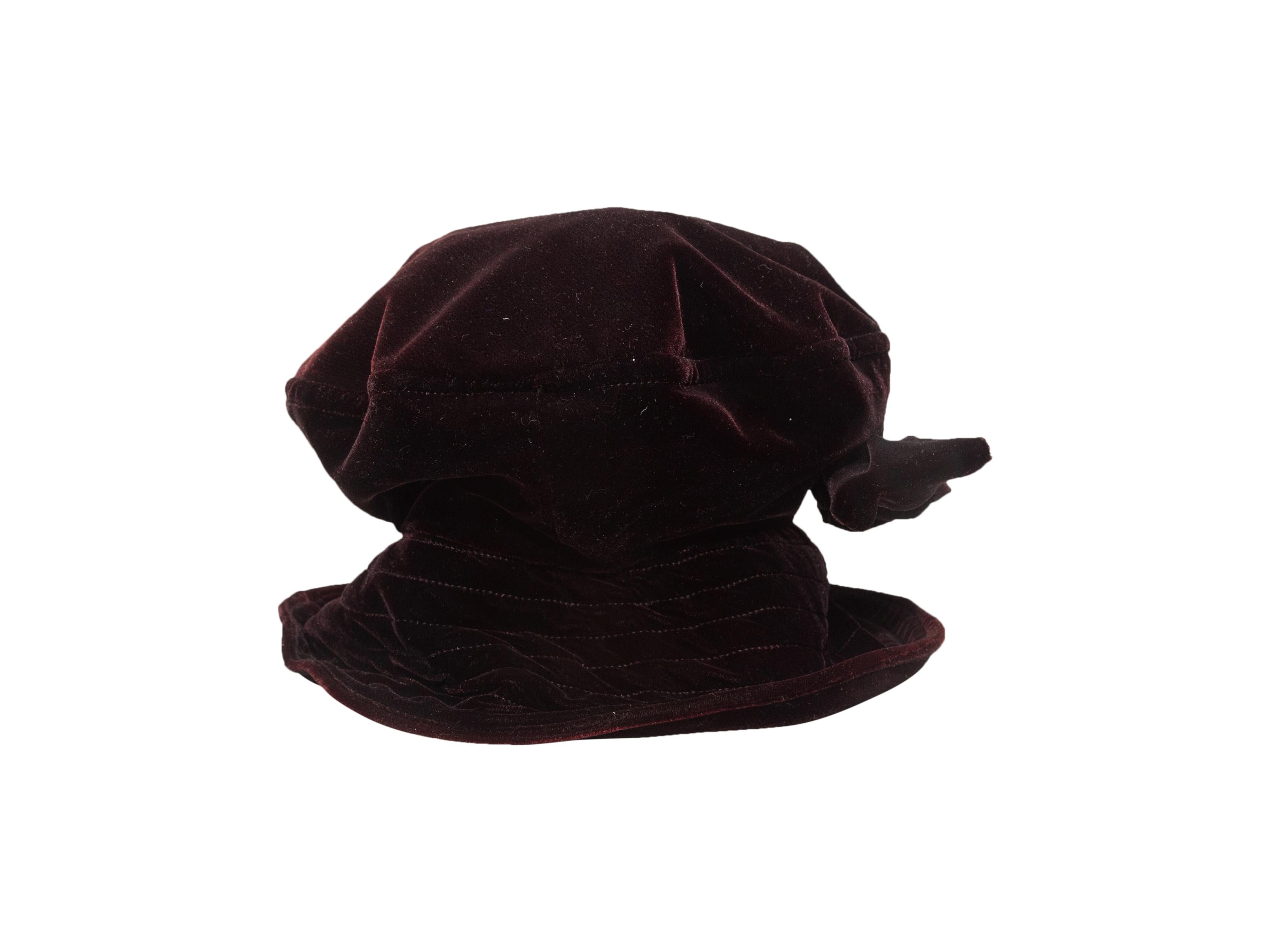 Product Details: Vintage wine and black velvet hat by Kokin. Bow accent at front. 7
