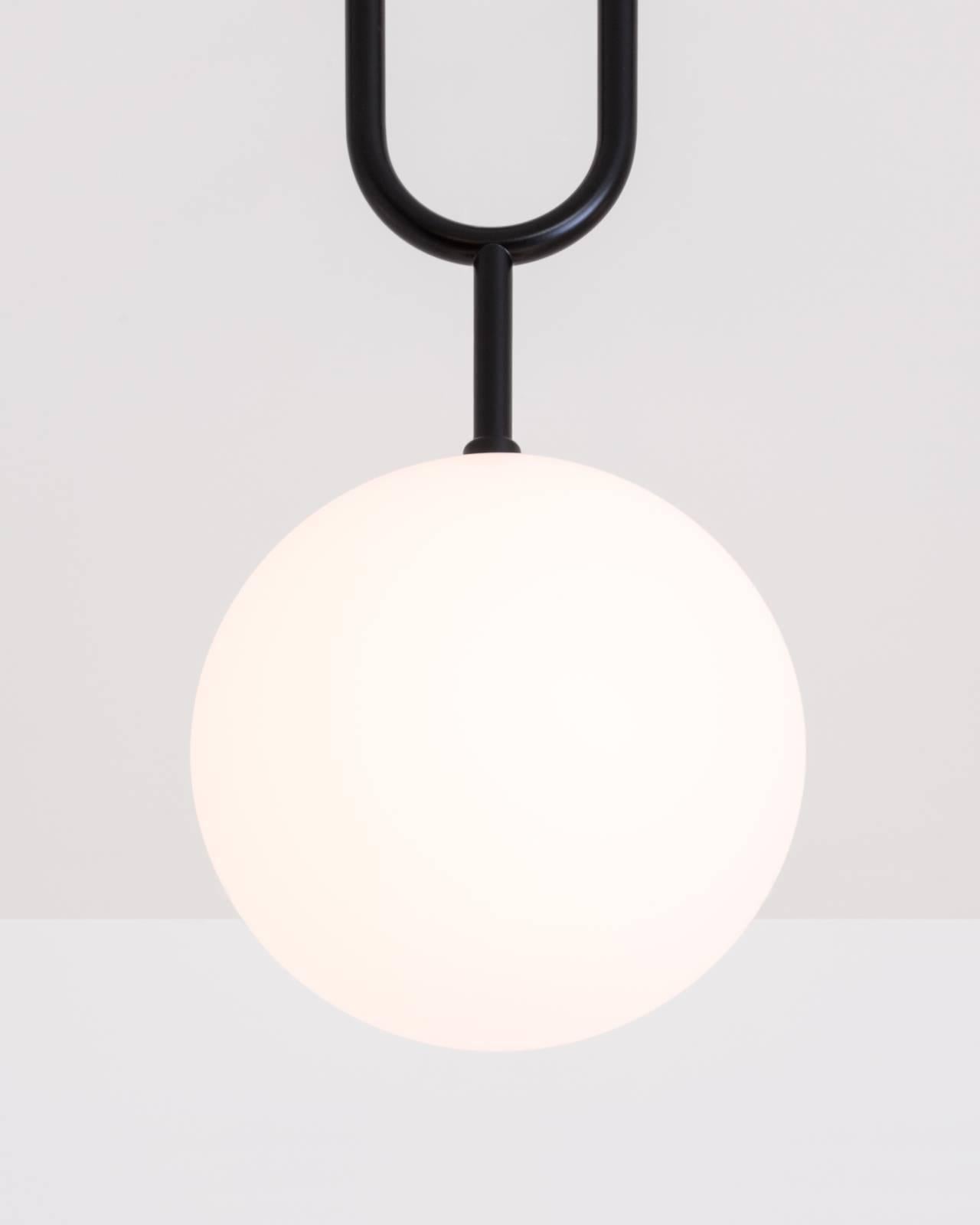 Koko, a Modern Pendant Light with Satin Globe Shade in Matte Black and Wood 1