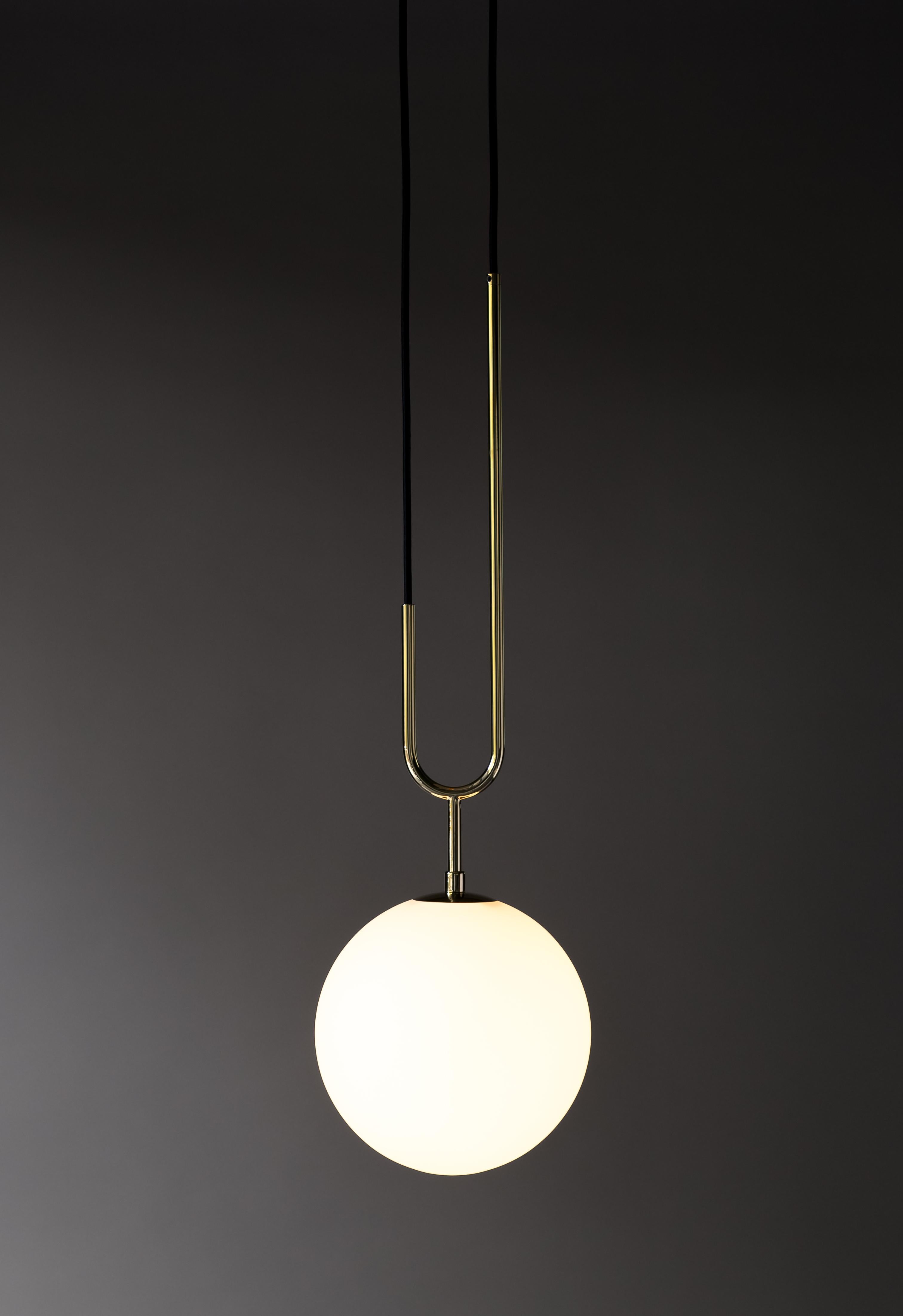 Koko

Drawing inspiration from a pearl pendant, the Koko collection is elegant and modern, with its luminous blown glass and brass arch detail. A versatile light, Koko can be displayed as a single pendant or arranged in a grouping as a