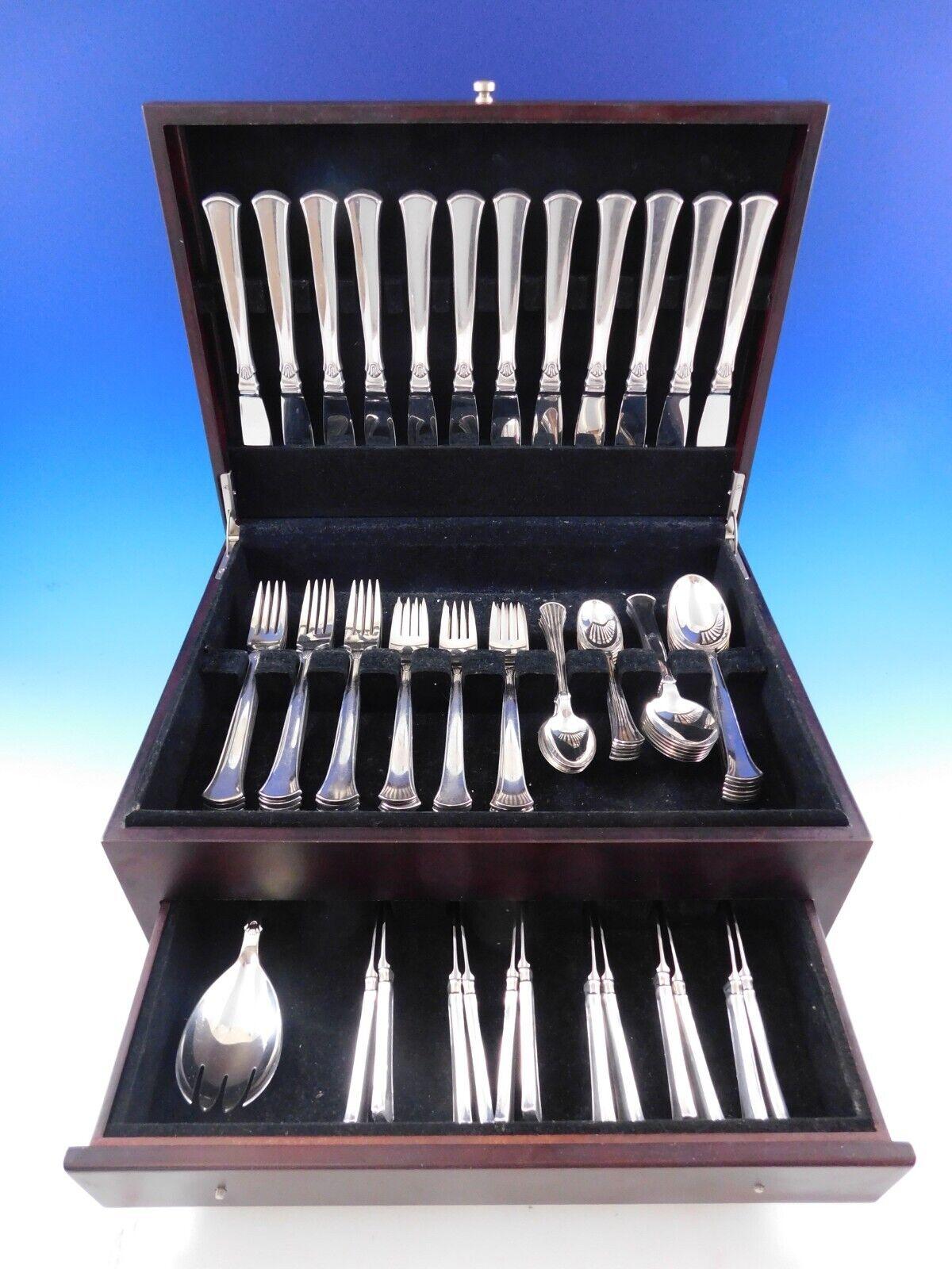 Scarce Koldring Aka Arvesolv #5 By Hans Hansen Danish sterling silver flatware set - 73 pieces. This set includes:


12 knives, long handle, 8 7/8