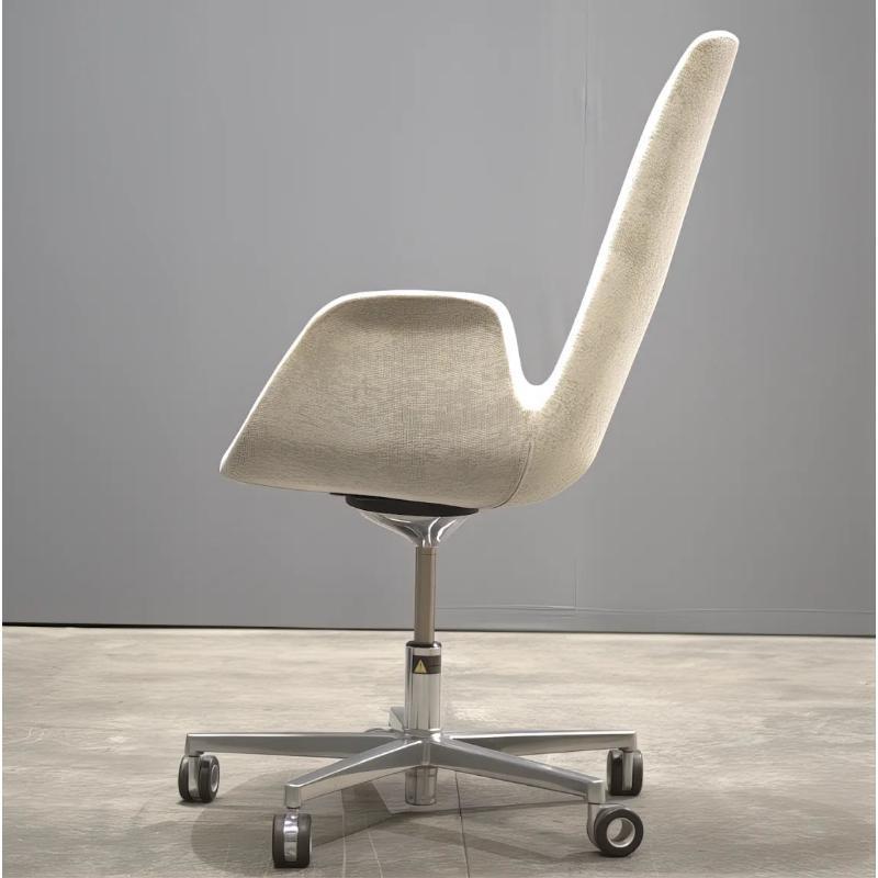 The Koleksiyon Halia Office Chair in Grey is a sophisticated piece of furniture that seamlessly blends functionality with modern aesthetics. Designed to provide maximum comfort during long working hours, this chair features a sleek, grey shell that