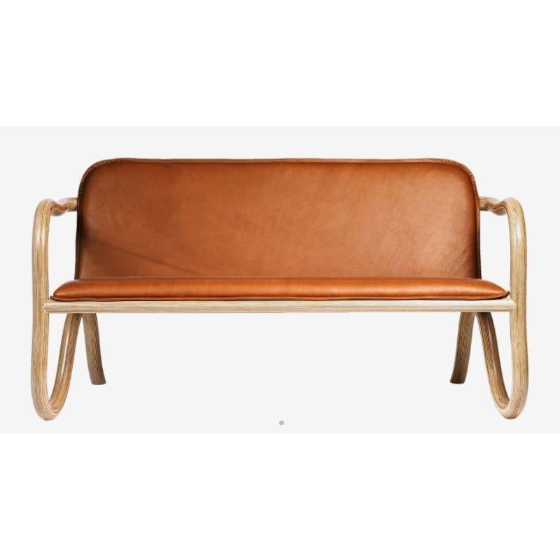 Kolho two seater natural, cognac leather by Made By Choice with Matthew Day Jackson
Kolho Collection 
Dimensions: 130 x 60 x 70 cm
Materials: Plywood (Upholstery Category 1)

Also available: Bill Amberg printed leather ‘1969’, upholstery category 1
