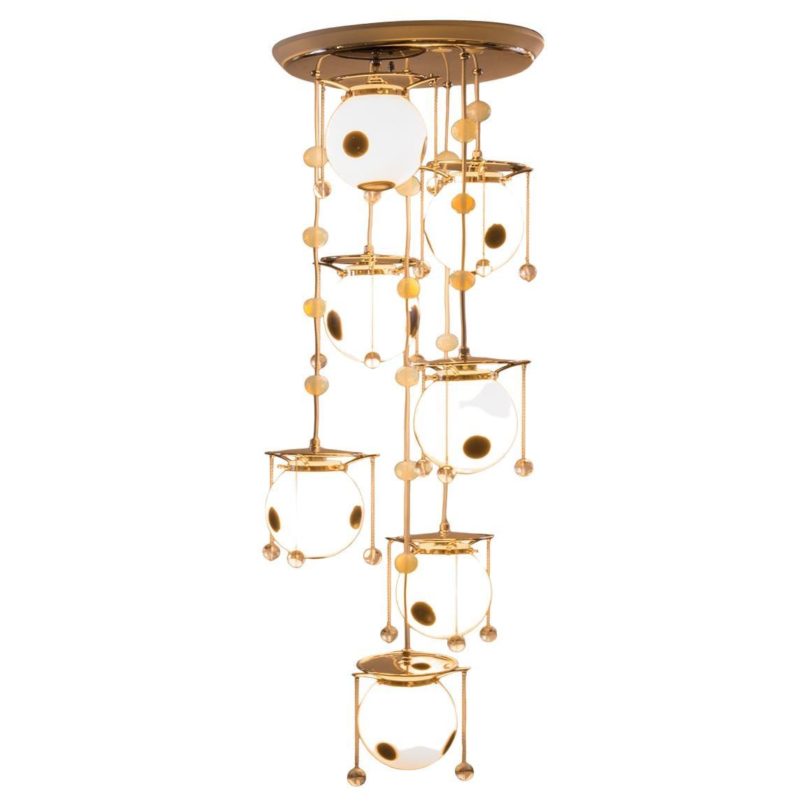 A very nice version from the often used design by Koloman Moser as well as by Josef Hoffmann, the total drop will be custom made. 
Originally manufactured at the Wiener Werkstaette Atelier, now custom made production at the Woka Lamps Workshop in
