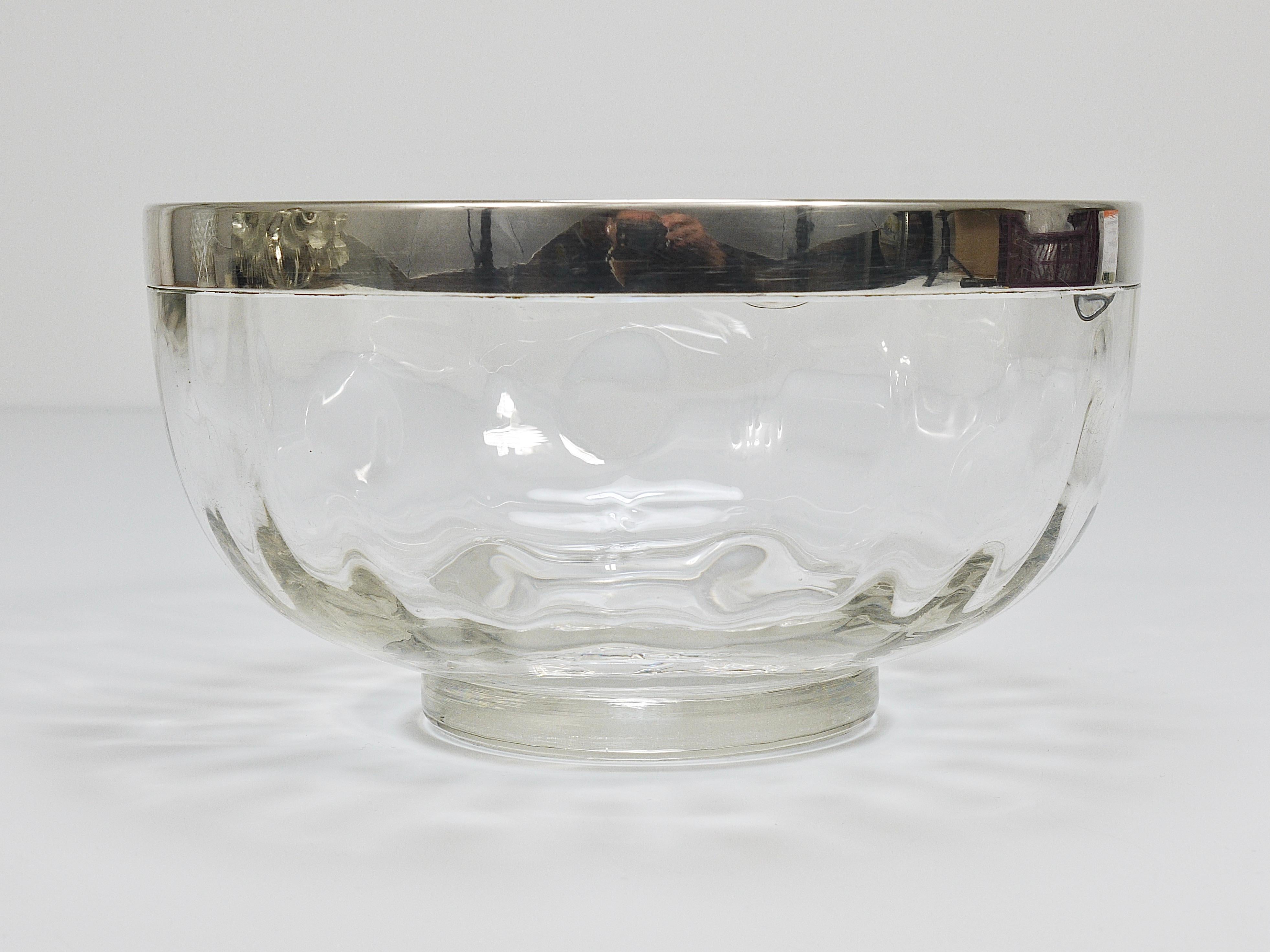 A beautiful Art Nouveau Vienna Secession mouth-blown „Meteor“ optical glass bowl with a rim made of silver-plated brass from the early 1900s. Designed by Koloman Moser (1868 - 1919), manufactured by Adolf Meyr's Neffe for E. Bakalowits Söhne in