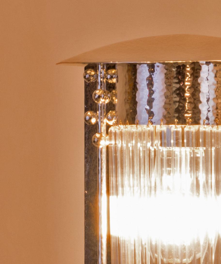 L'année de la création de la Wiener Werkstätte, Kolo Moser a conçu plusieurs lampes de table, dont quatre qui se ressemblent grâce à leur couvercle en forme de dôme. Les lampes sont enregistrées dans les volumes de calcul de WW sous les numéros de