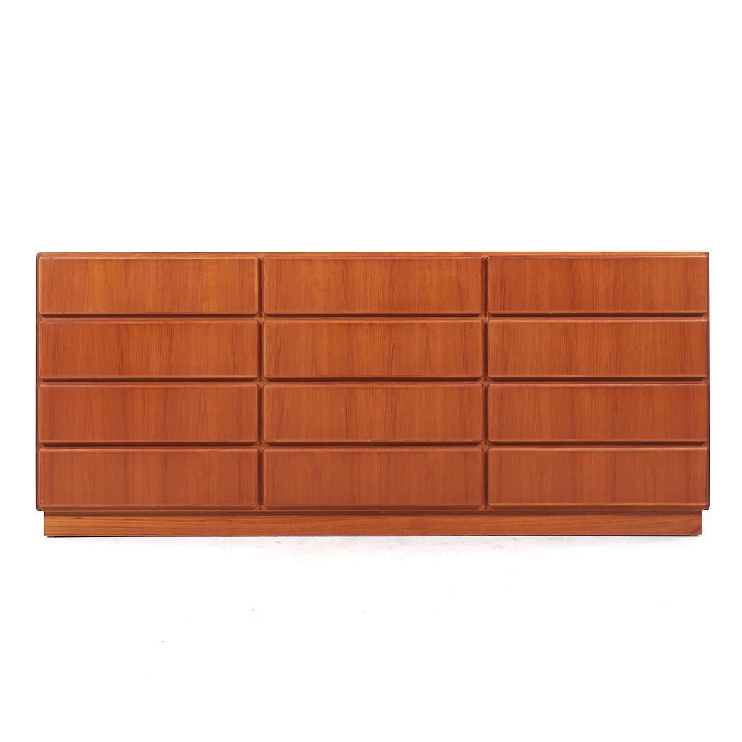 Komfort Mid Century Danish Teak 12 Drawer Lowboy Dresser

This lowboy measures: 71.75 wide x 18.75 deep x 30.5 inches high

All pieces of furniture can be had in what we call restored vintage condition. That means the piece is restored upon purchase