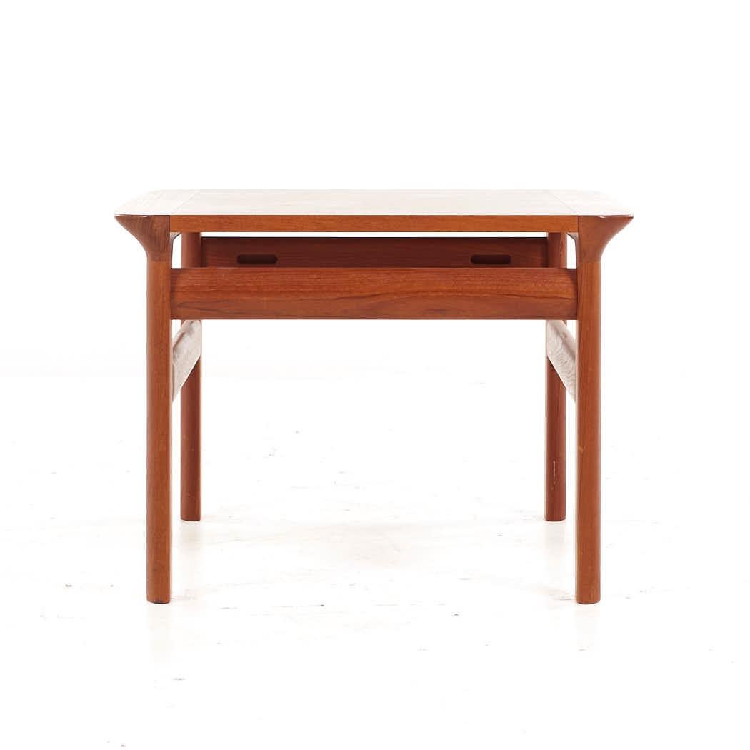 Komfort Mid Century Danish Teak Side End Table

This side table measures: 27.75 wide x 28 deep x 19.75 inches high

All pieces of furniture can be had in what we call restored vintage condition. That means the piece is restored upon purchase so it’s