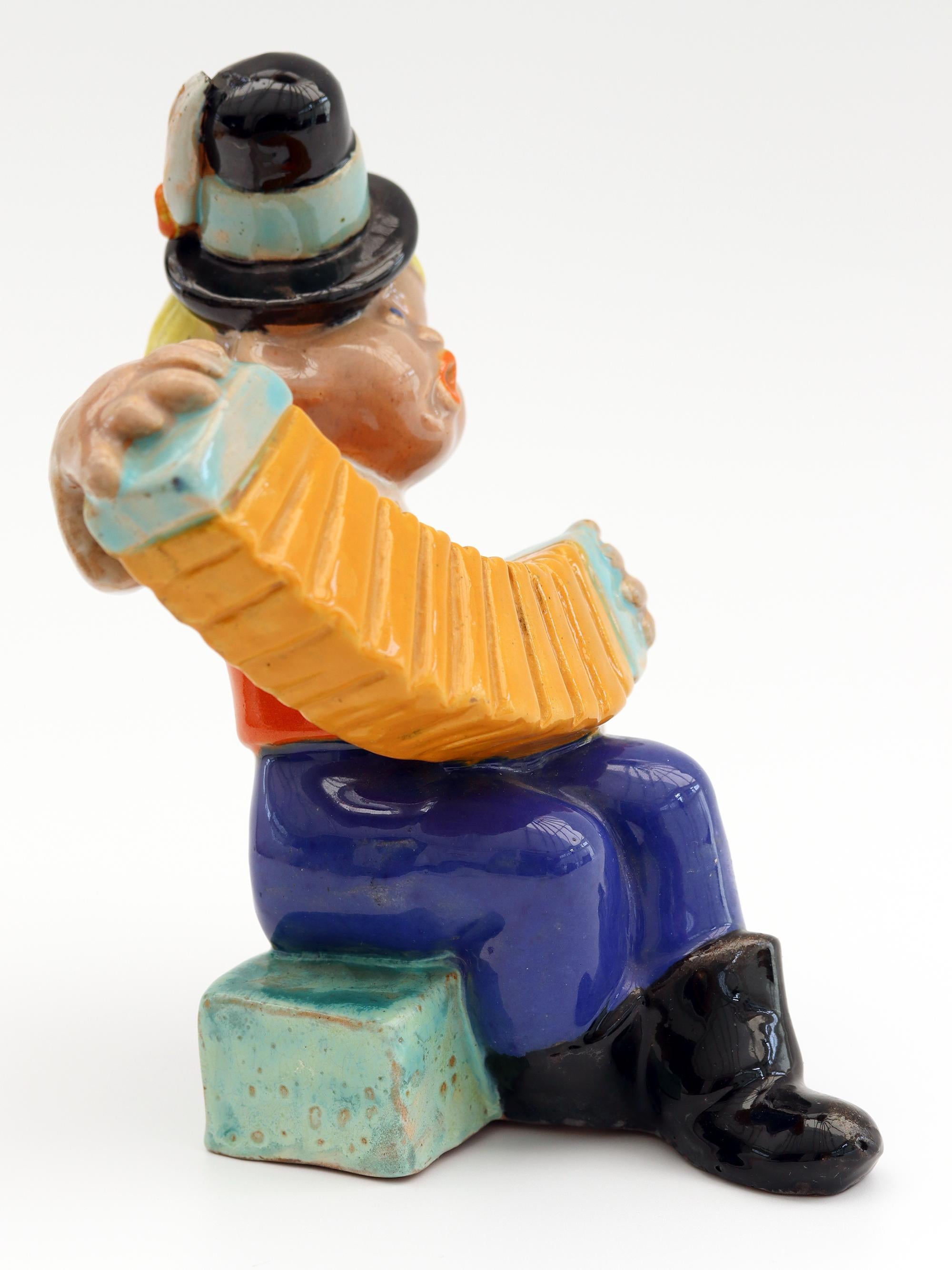 Hand-Painted Komlos Hungarian Art Deco Pottery Musician Figure, circa 1930 For Sale
