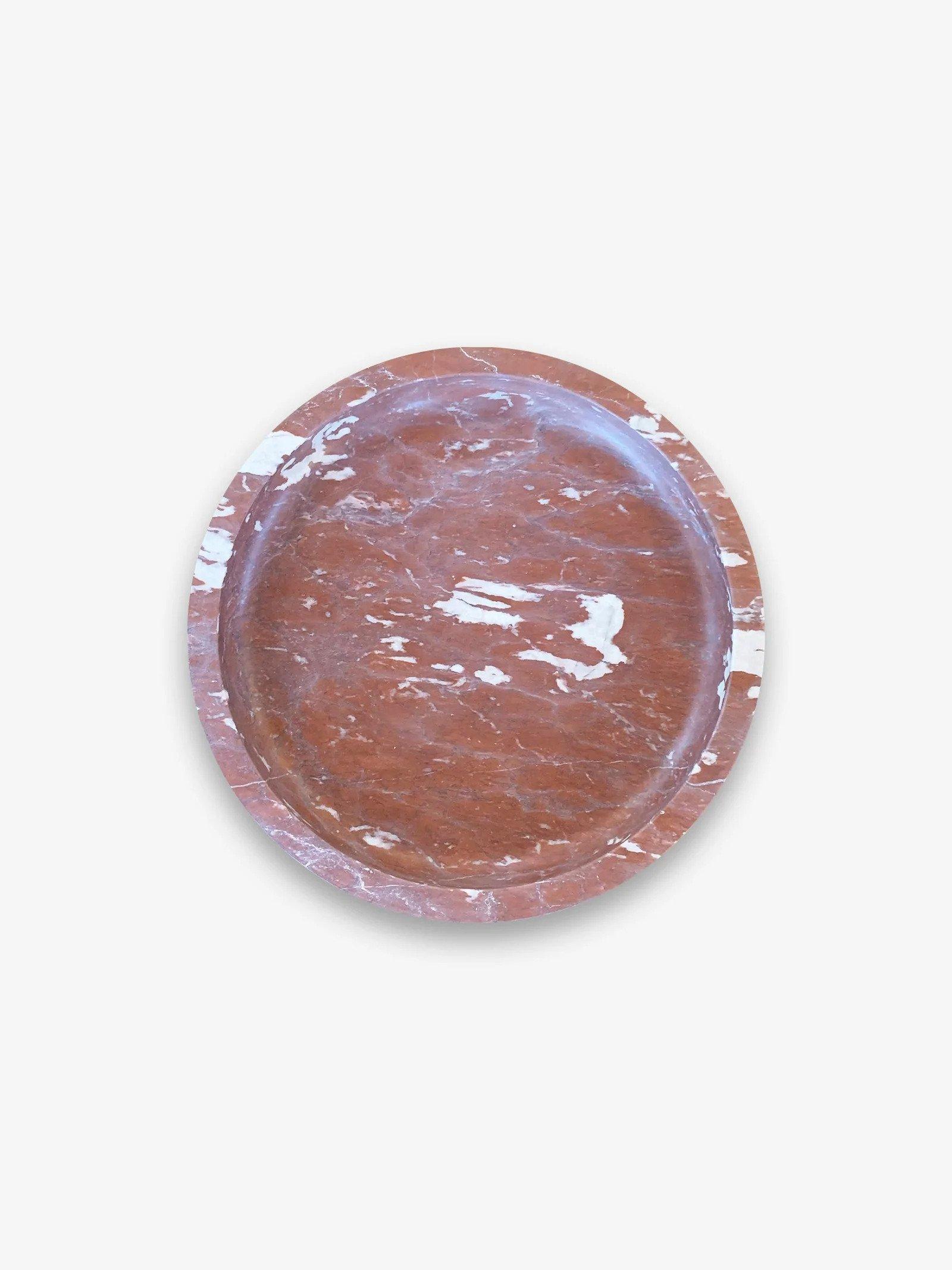Simple display with cunning execution. The Komm Bowl from Michael Verheyden is an ordinary object that would be the perfect finishing piece to any countertop or table. This Komm bowl is made in beautiful Rosso Francia, a red marble only quarried in