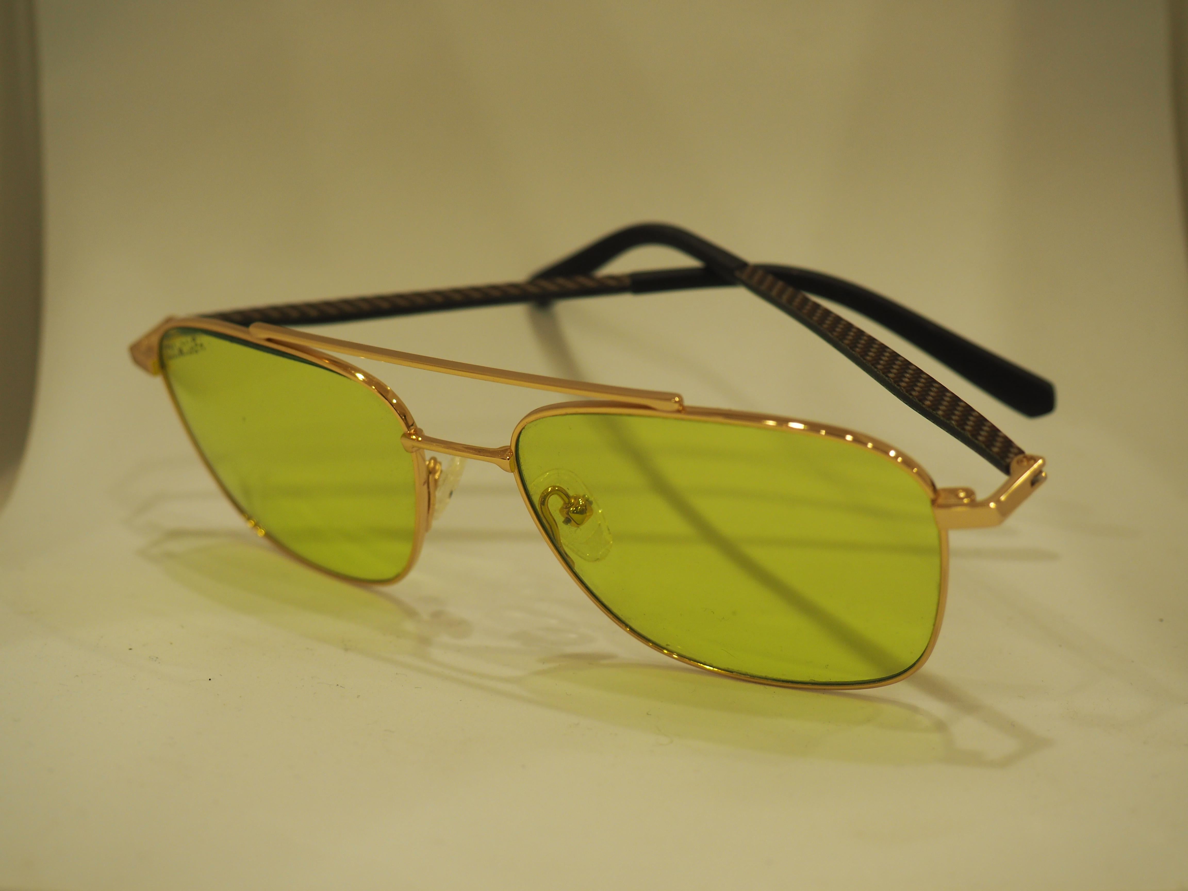 Brown Kommafa green lenses sunglasses