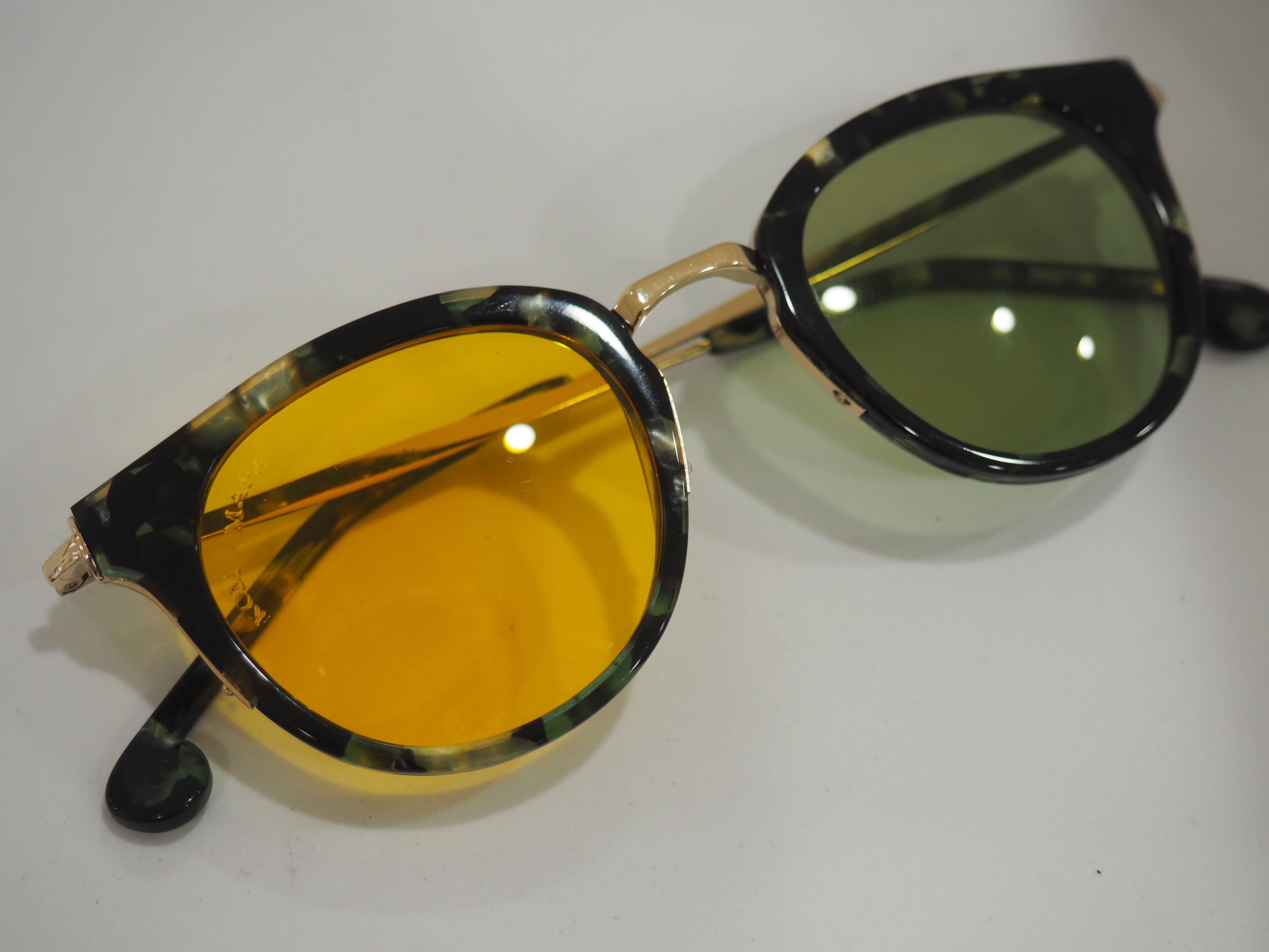 Black Kommafa yellow green tortoise sunglasses