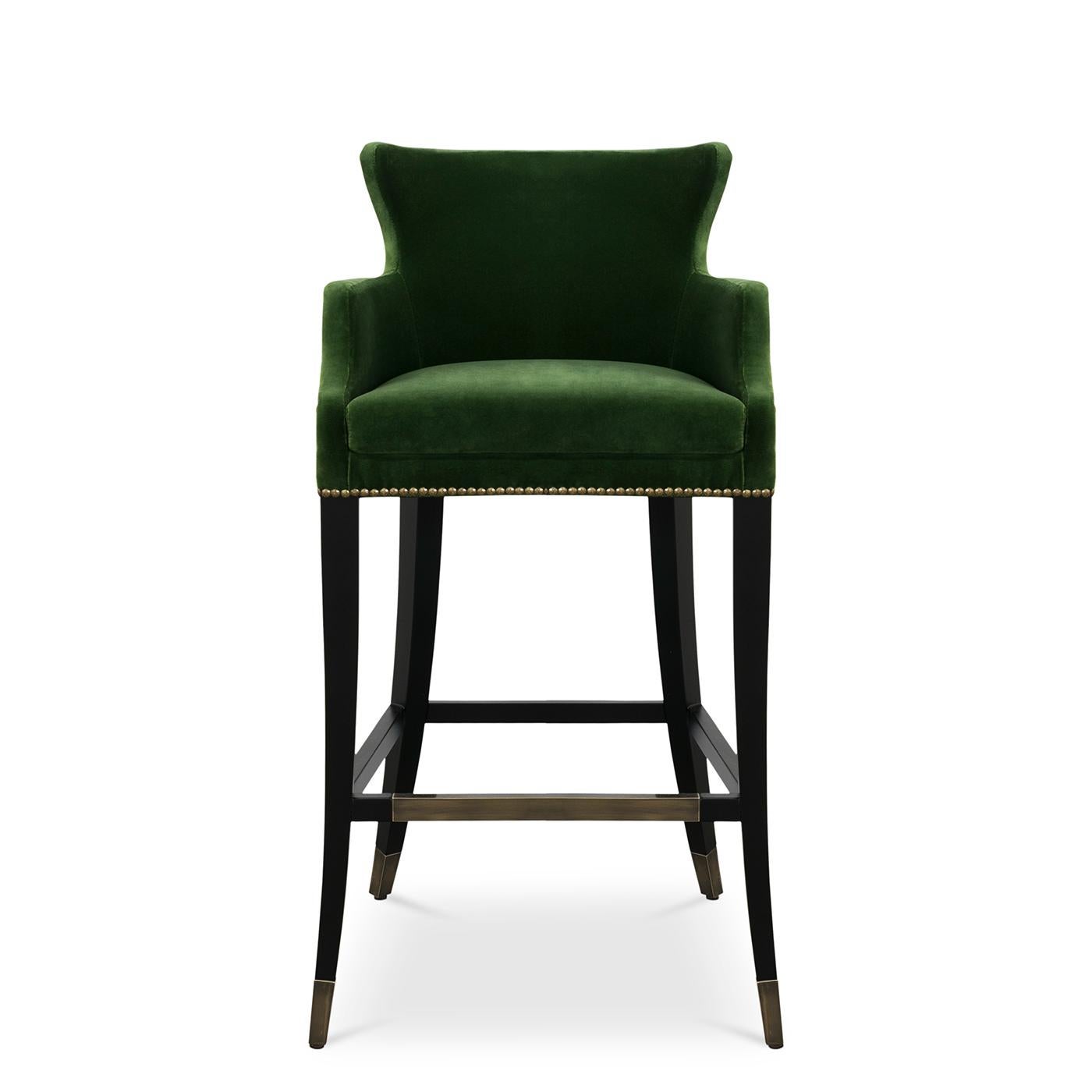 Bar stool Komo with solid wood structure in black finish,
upholstered and covered with Grade A velvet fabric.
With reinforced footrest and feet in solid brass in brushed finish.
Also available with other fabric colors finishes in Grade A, 
on